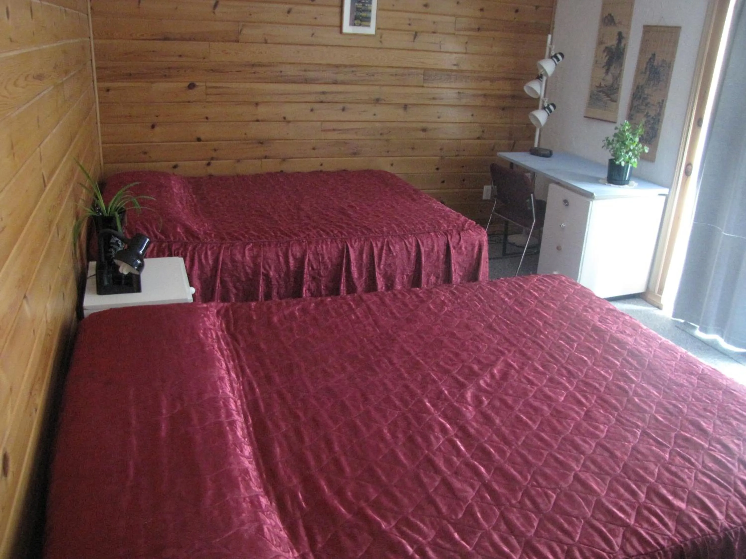 Bed in Quiet Bay Inn & Café