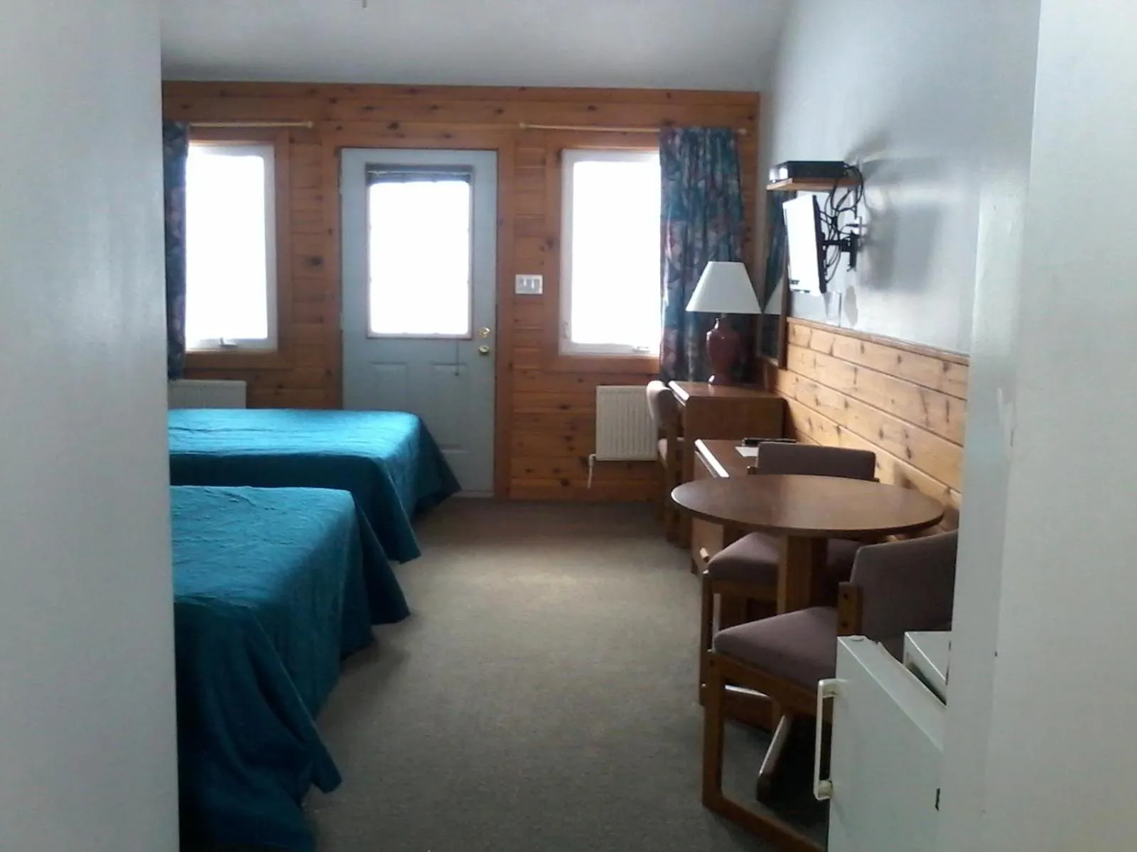 Bed in Quiet Bay Inn & Café