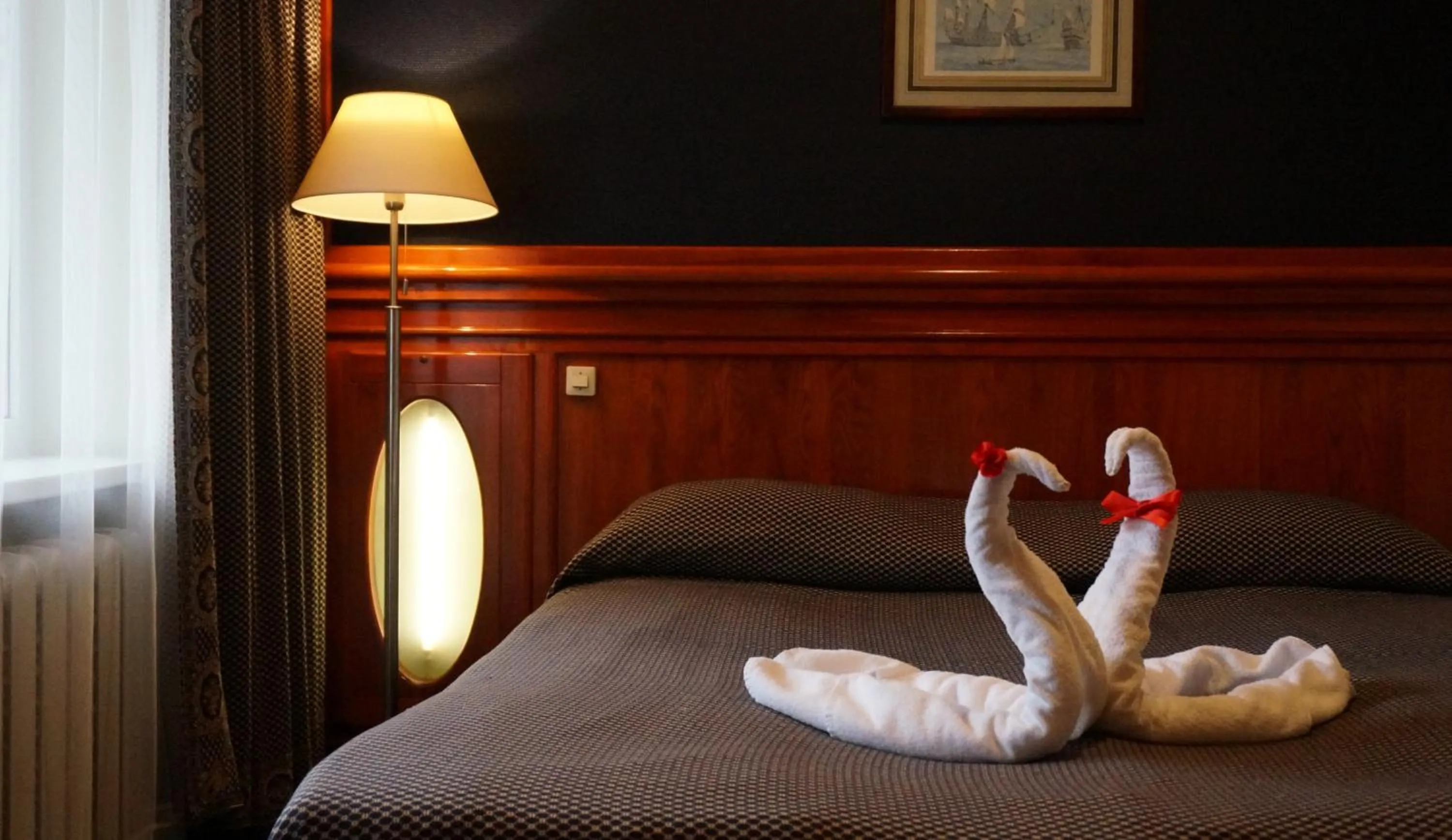 Property building, Bed in Tauras Center Hotel