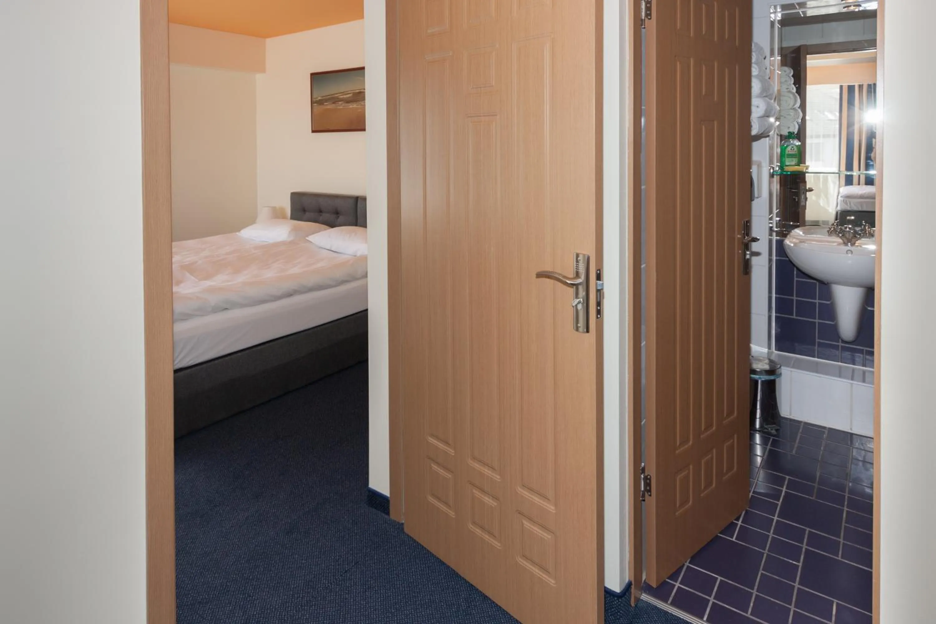 Bed in Tauras Center Hotel