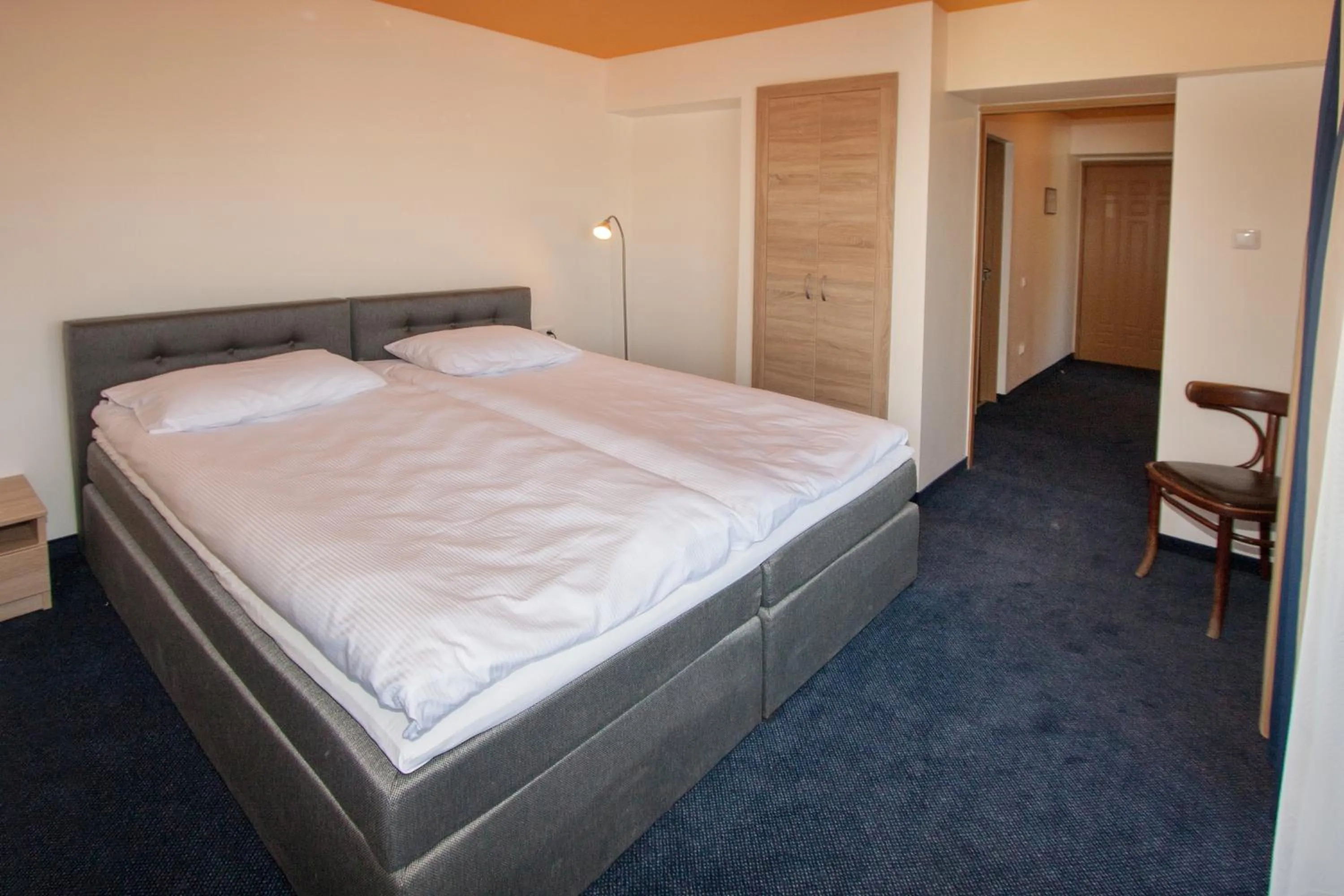 Bed in Tauras Center Hotel