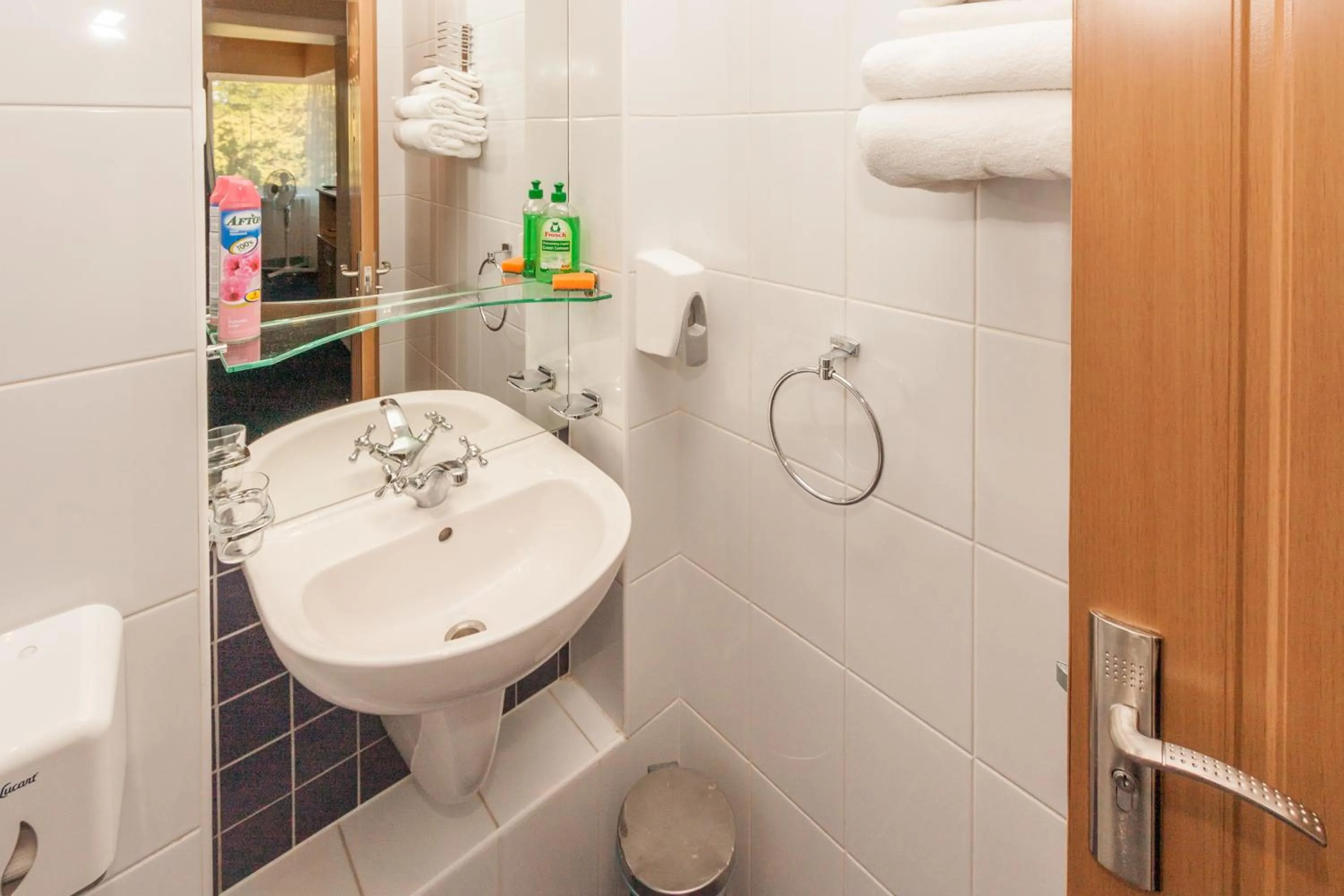 Bathroom in Tauras Center Hotel