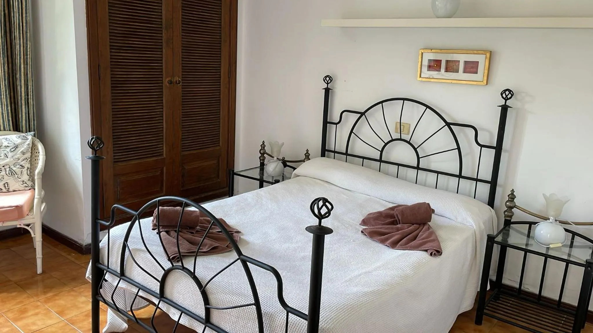 Bed in Apartamentos las Acacias