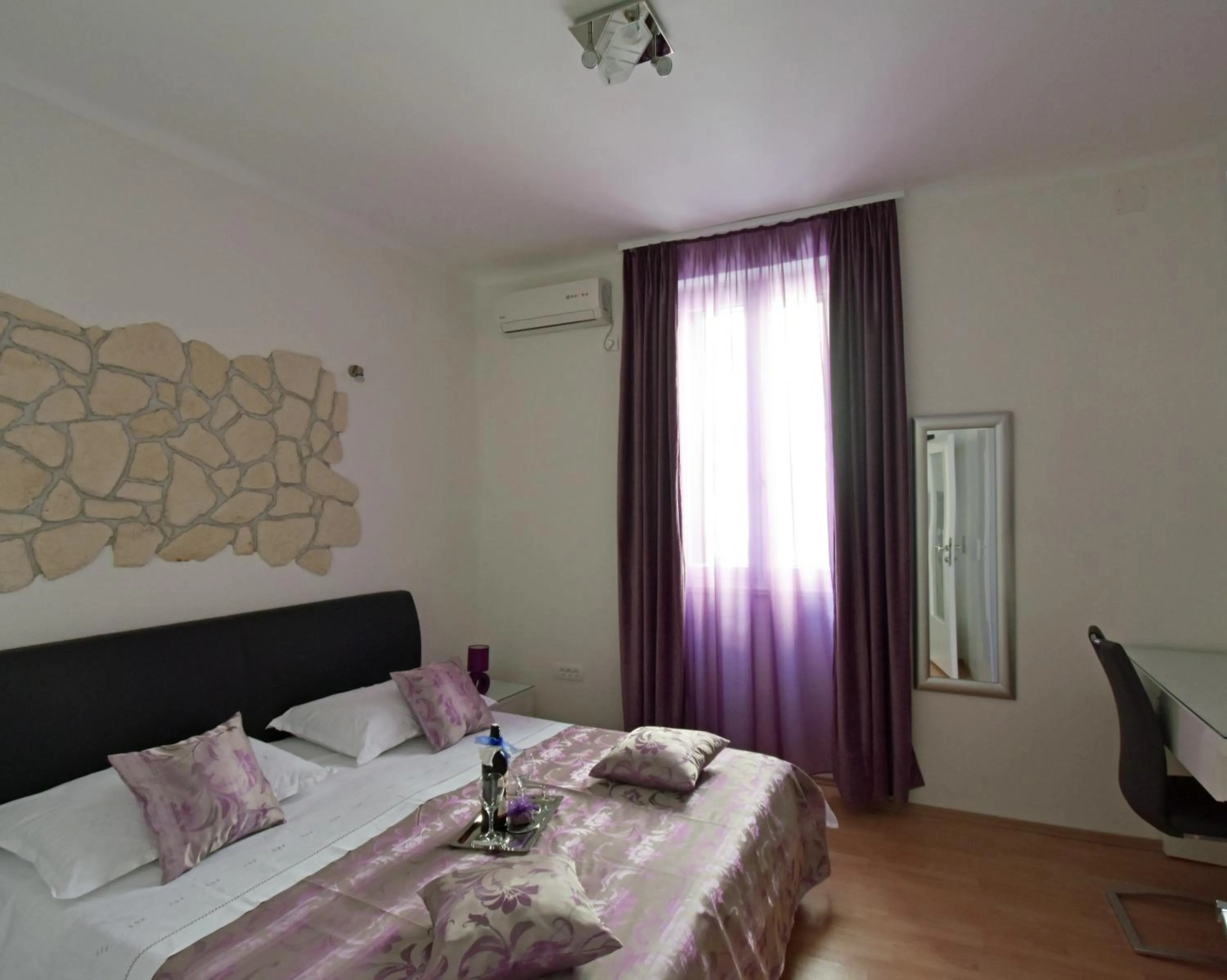 Bedroom in Kuzma Rooms and Apartments