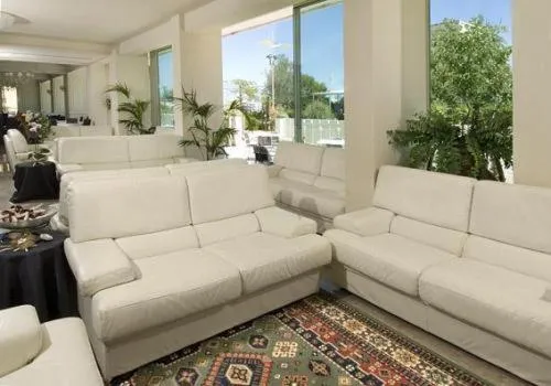 Communal lounge/ TV room in Hotel Alba