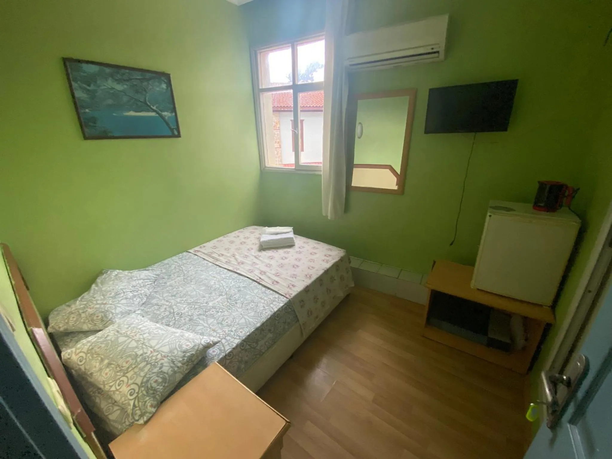 Bed in Camel Hotel & Apart