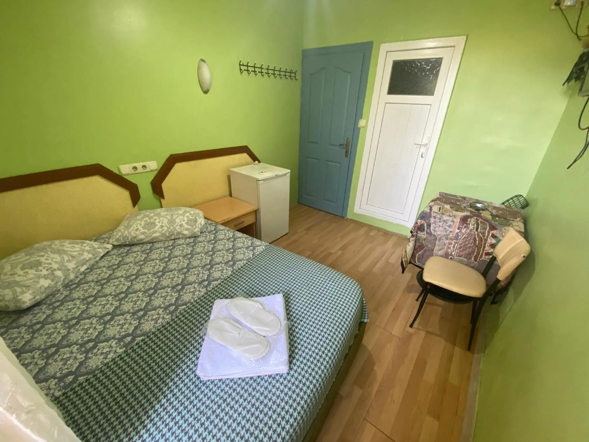 Bed in Camel Hotel & Apart