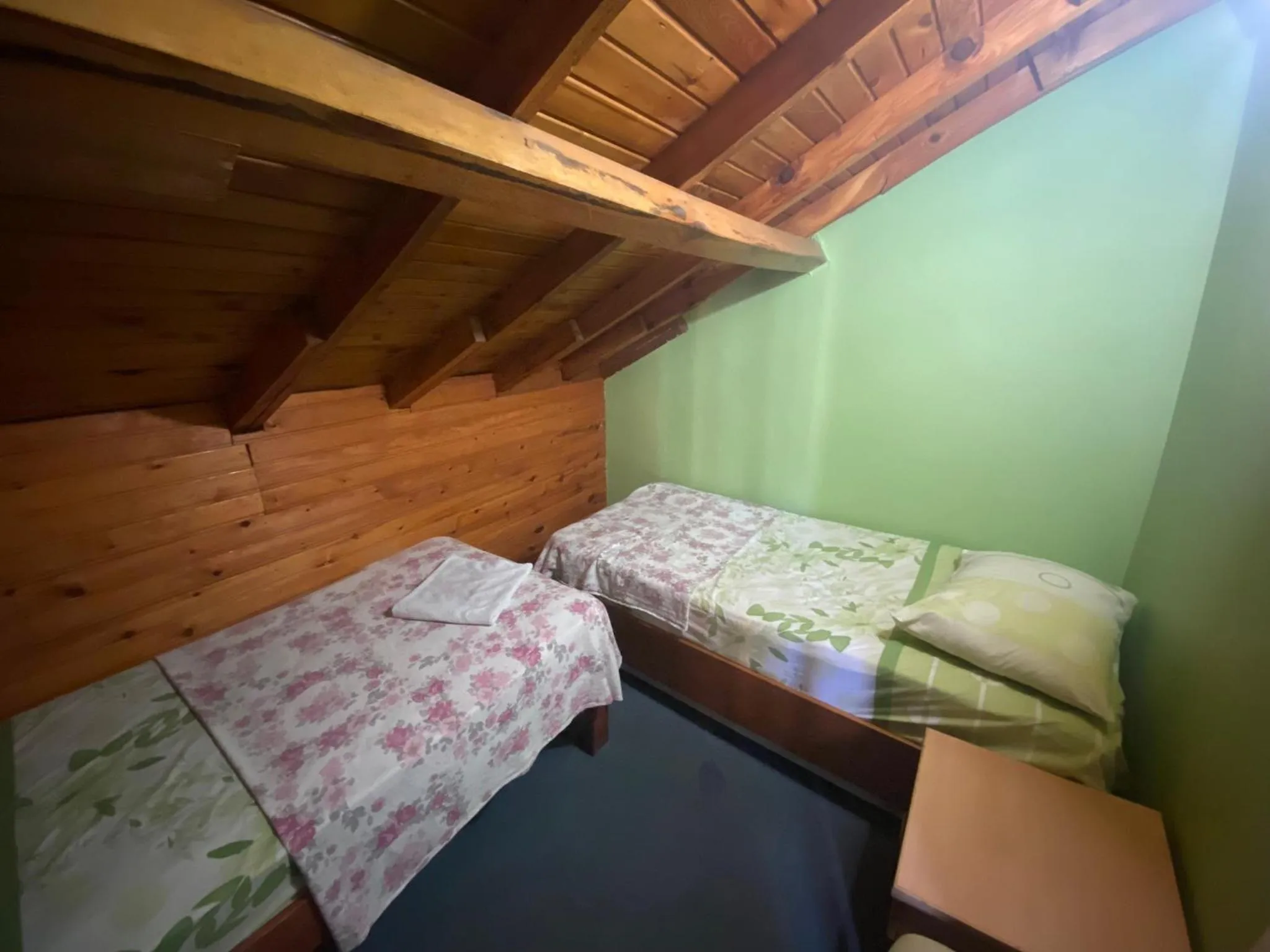 Bed in Camel Hotel & Apart