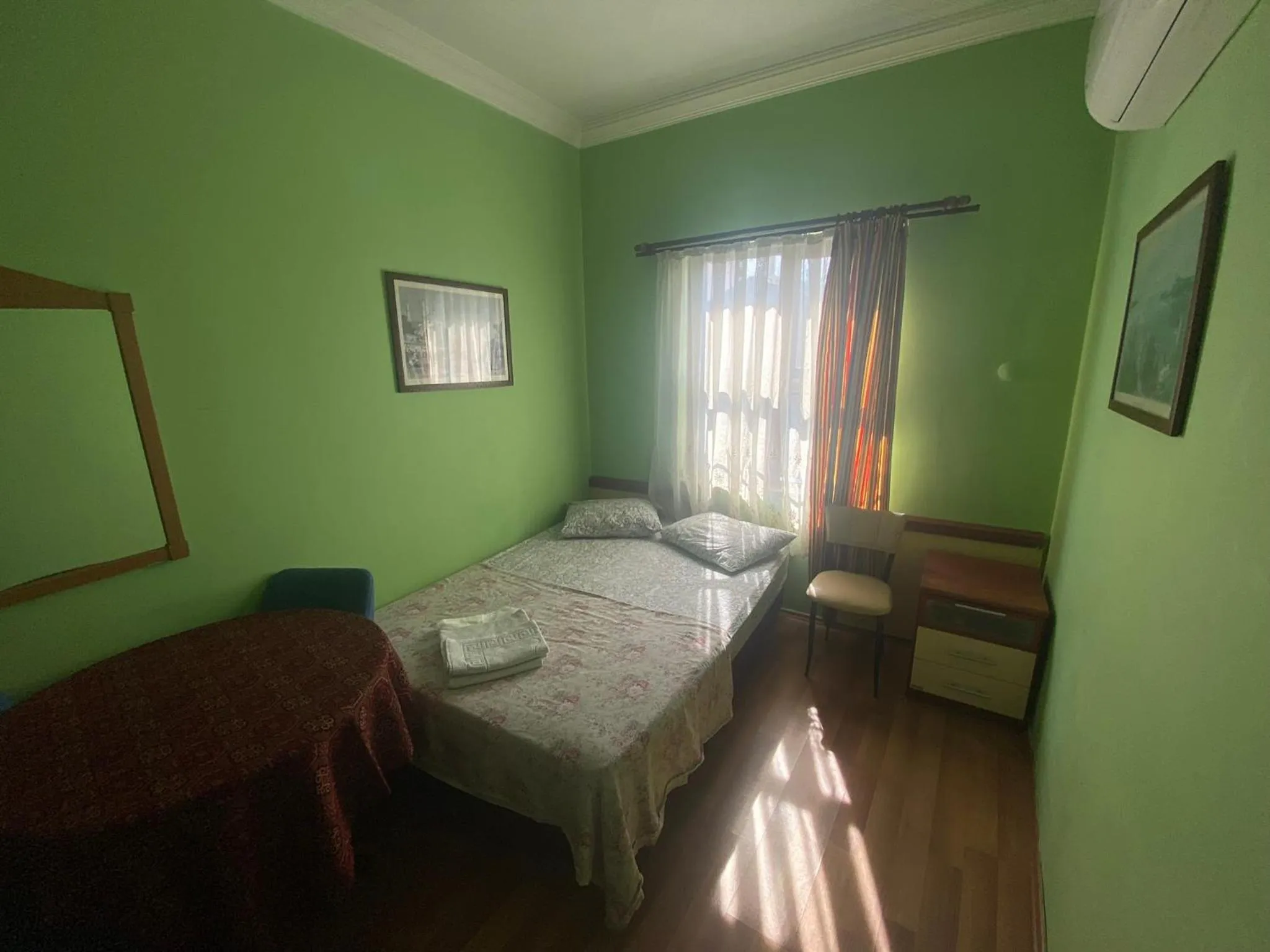 Bed in Camel Hotel & Apart