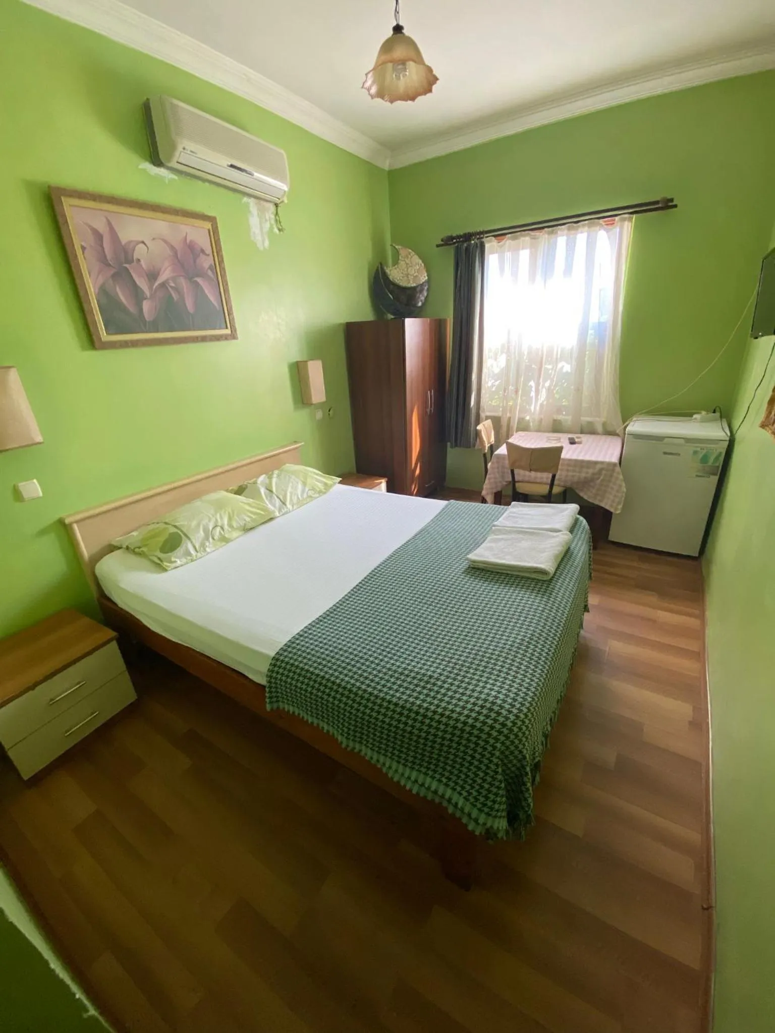 Bed in Camel Hotel & Apart