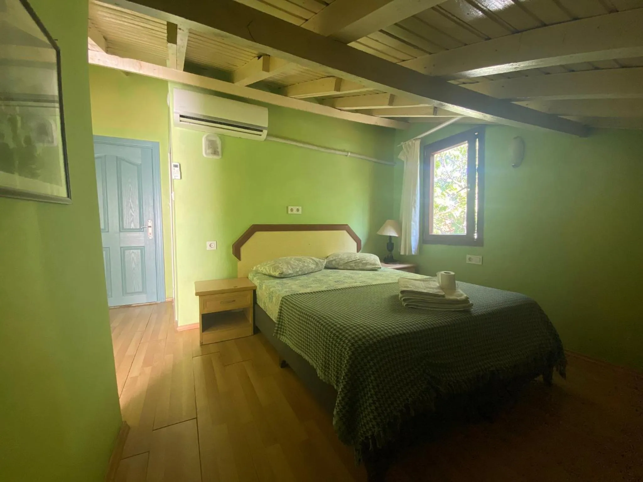 Bed in Camel Hotel & Apart