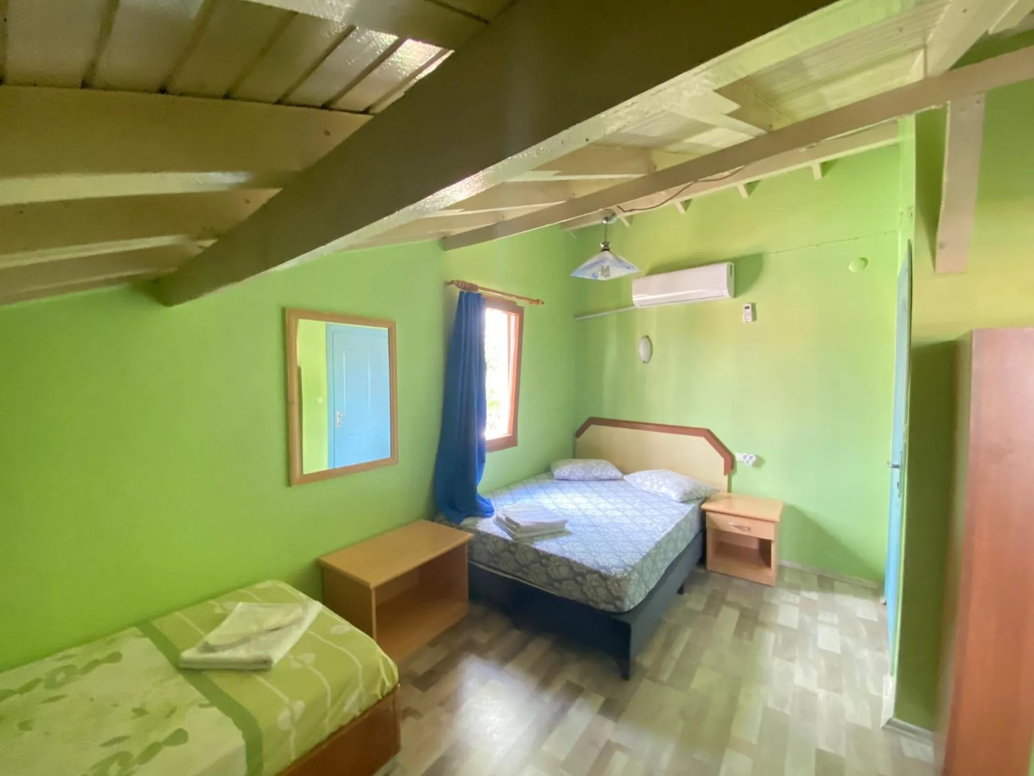 Bed in Camel Hotel & Apart