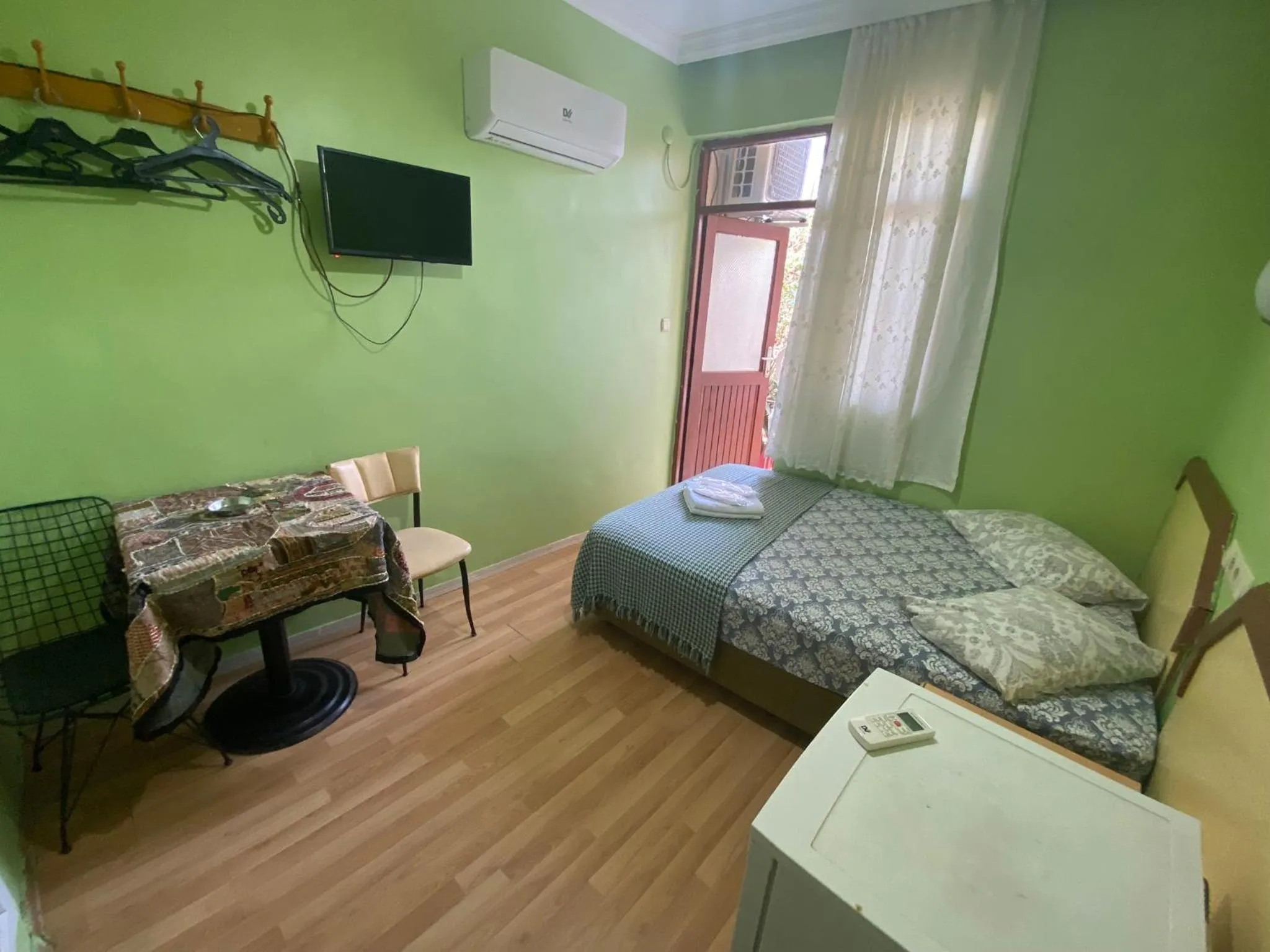 Bed in Camel Hotel & Apart