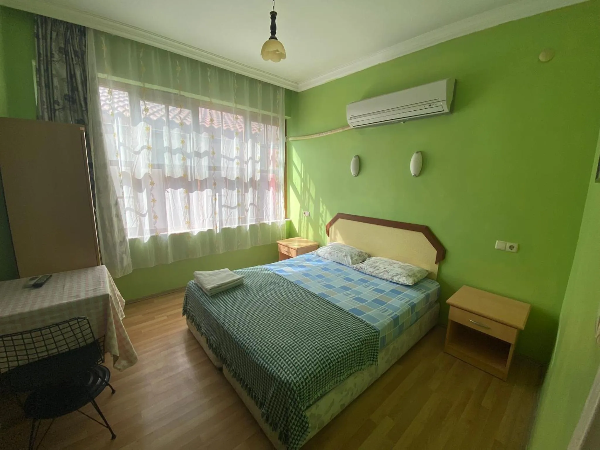 Bed in Camel Hotel & Apart