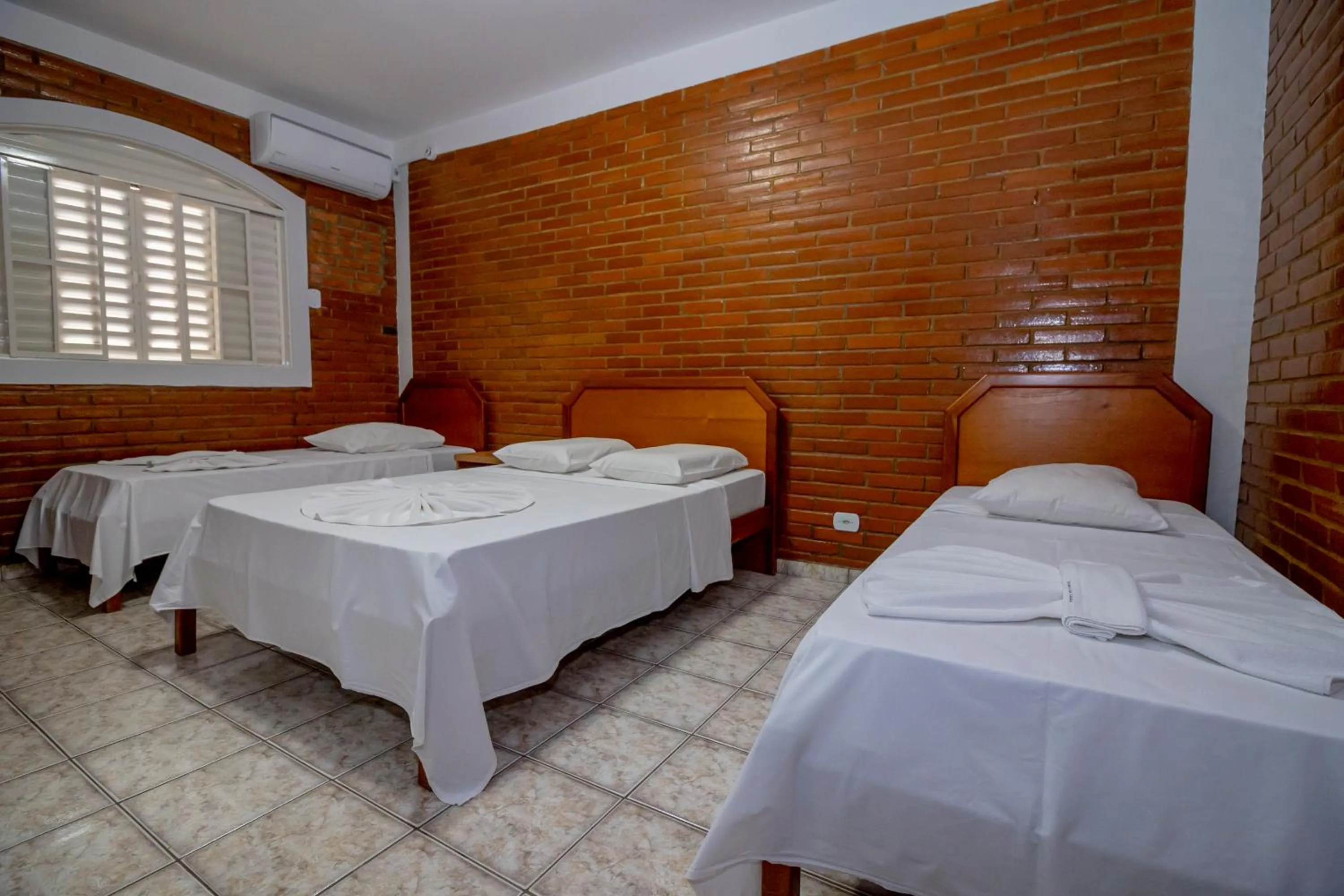 Bed in Pousada Recanto das Caldas