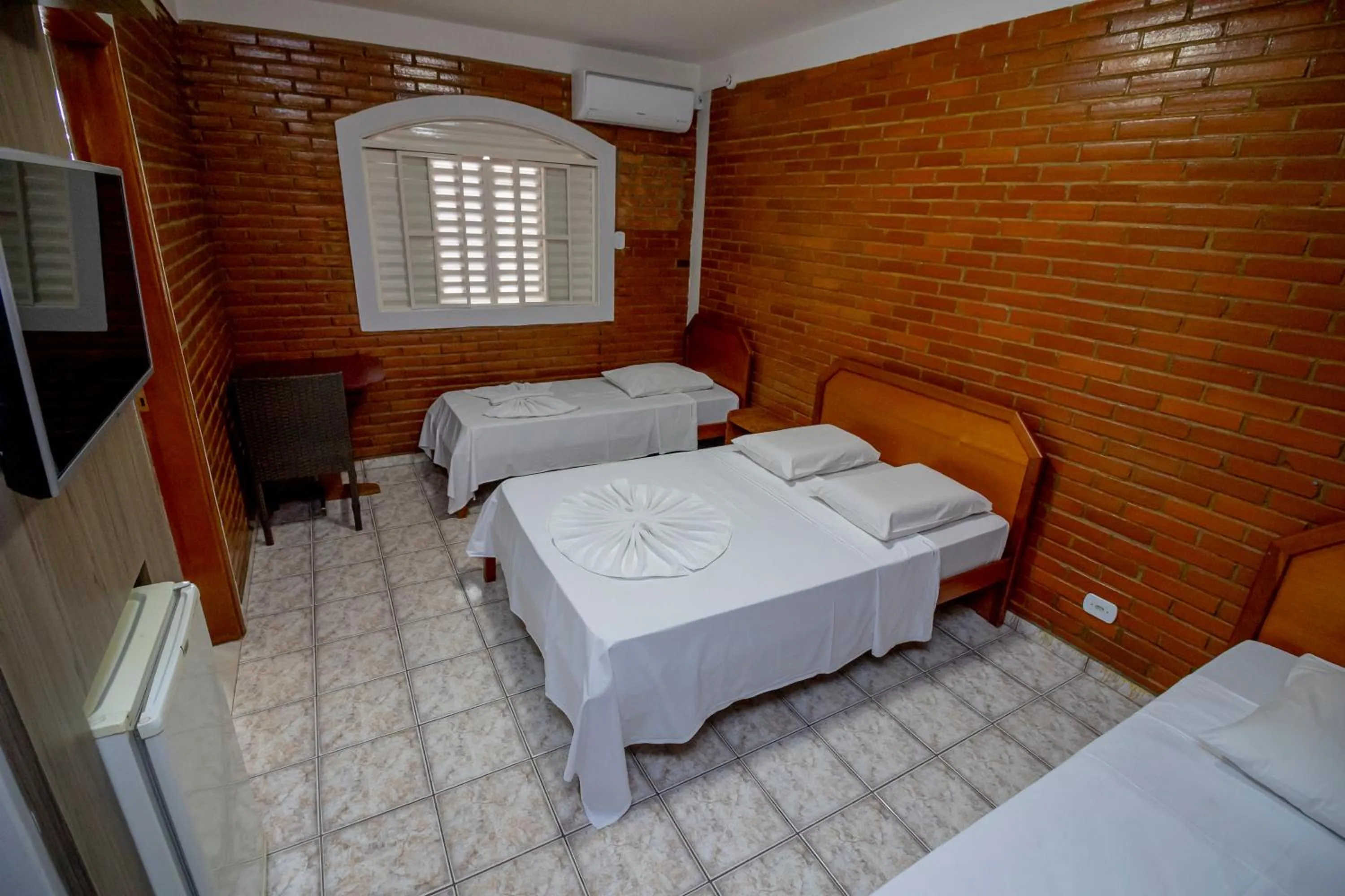 Bed in Pousada Recanto das Caldas