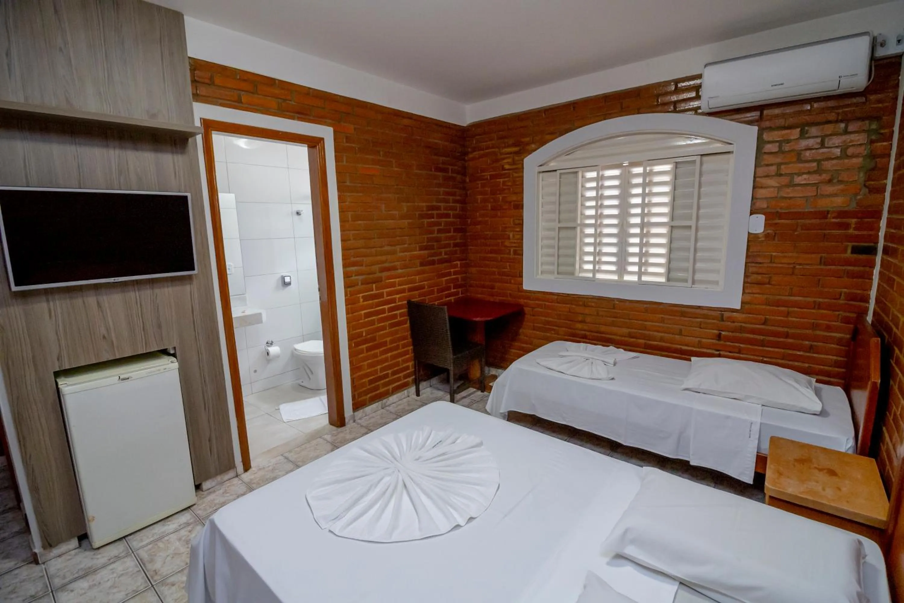 Photo of the whole room, Bed in Pousada Recanto das Caldas
