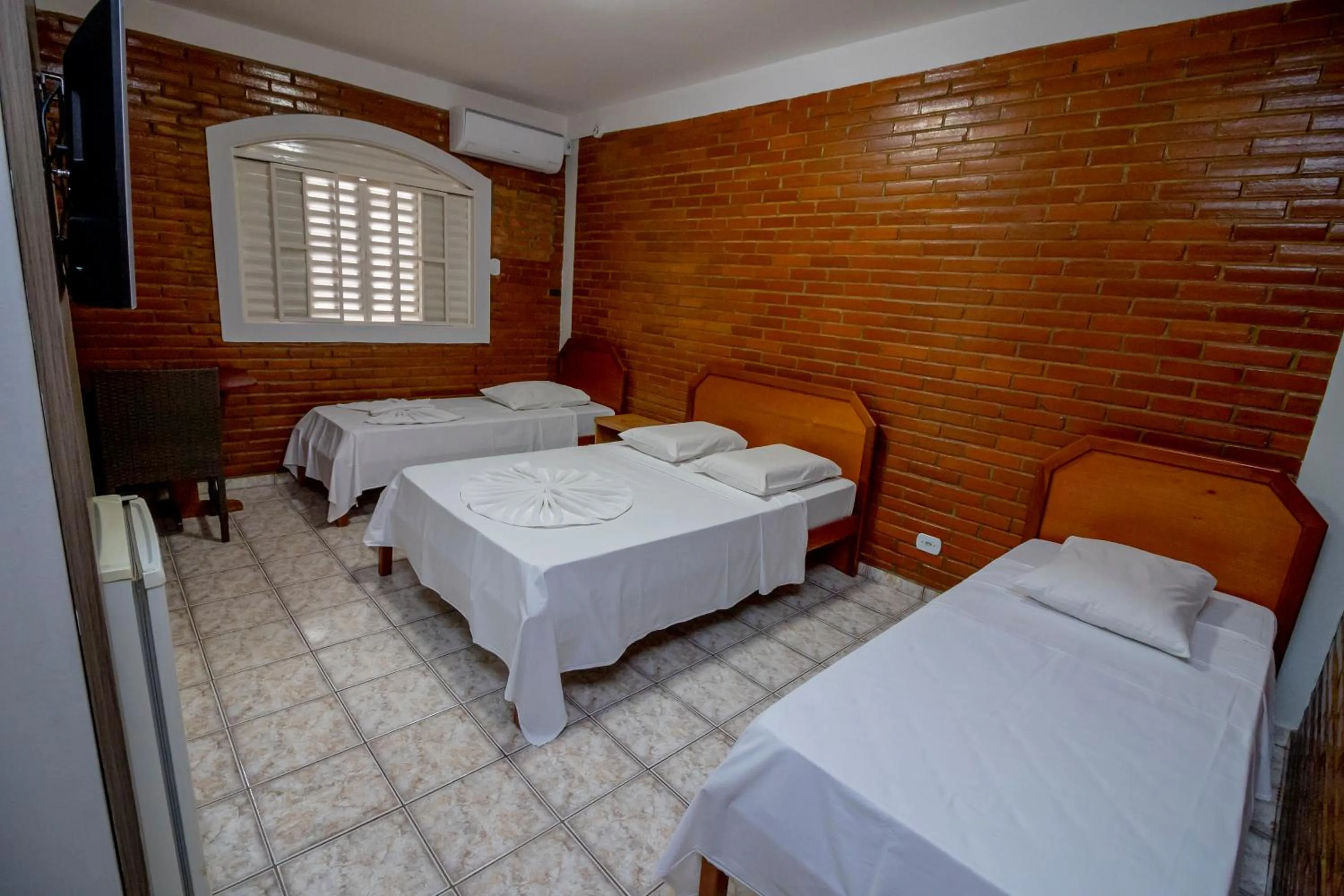 Bed in Pousada Recanto das Caldas