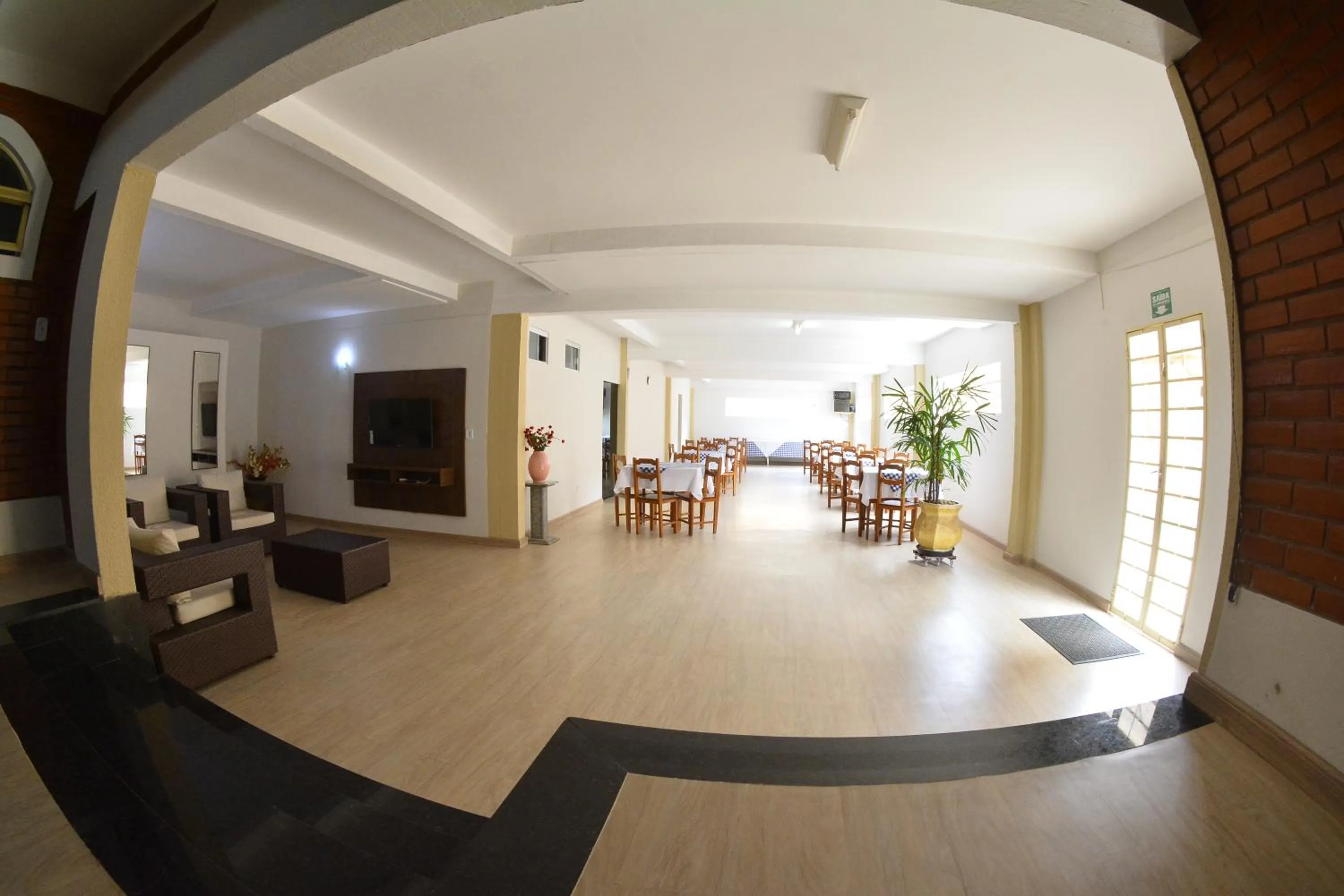 Communal lounge/ TV room in Pousada Recanto das Caldas