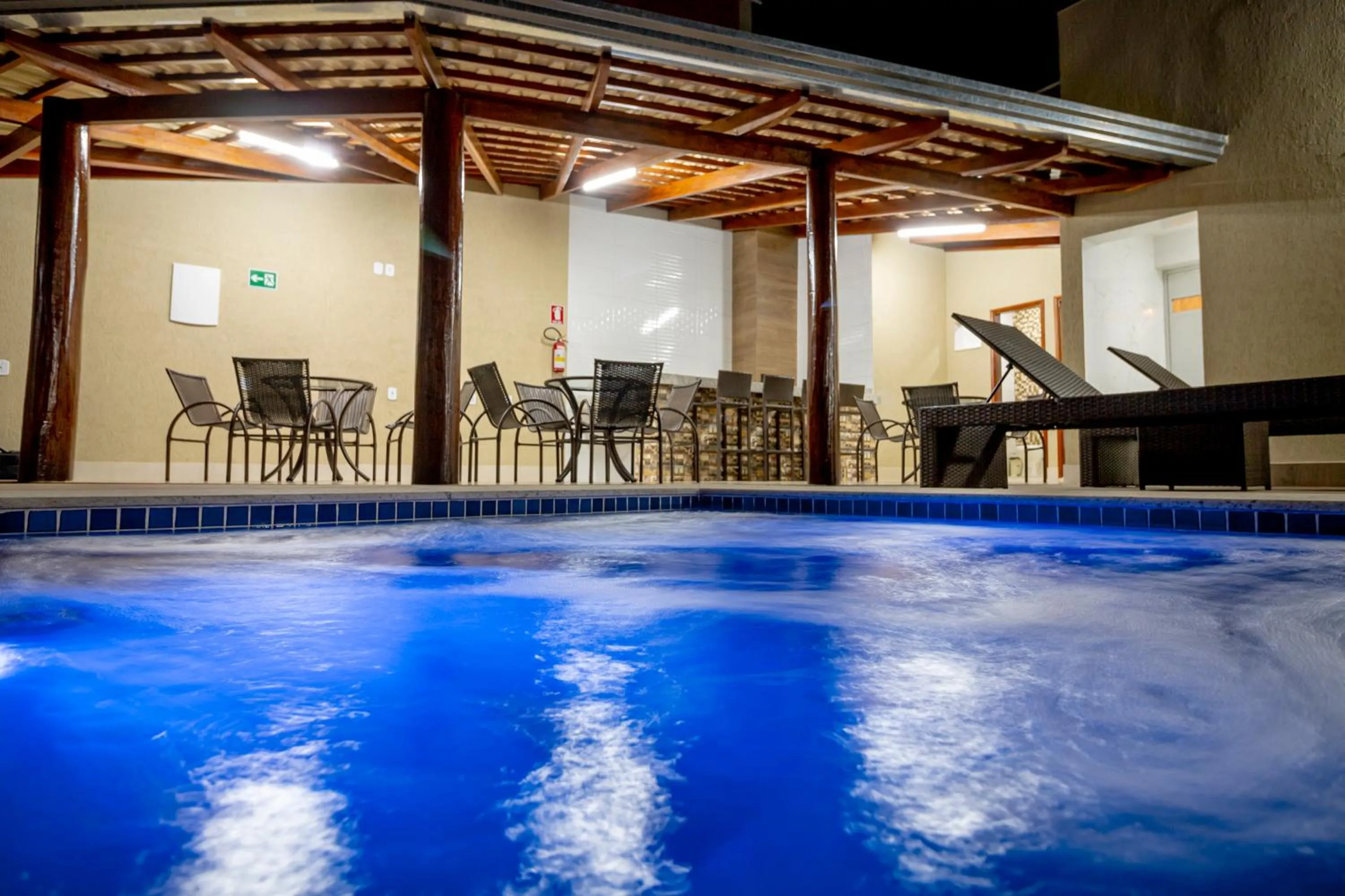 Swimming pool in Pousada Recanto das Caldas