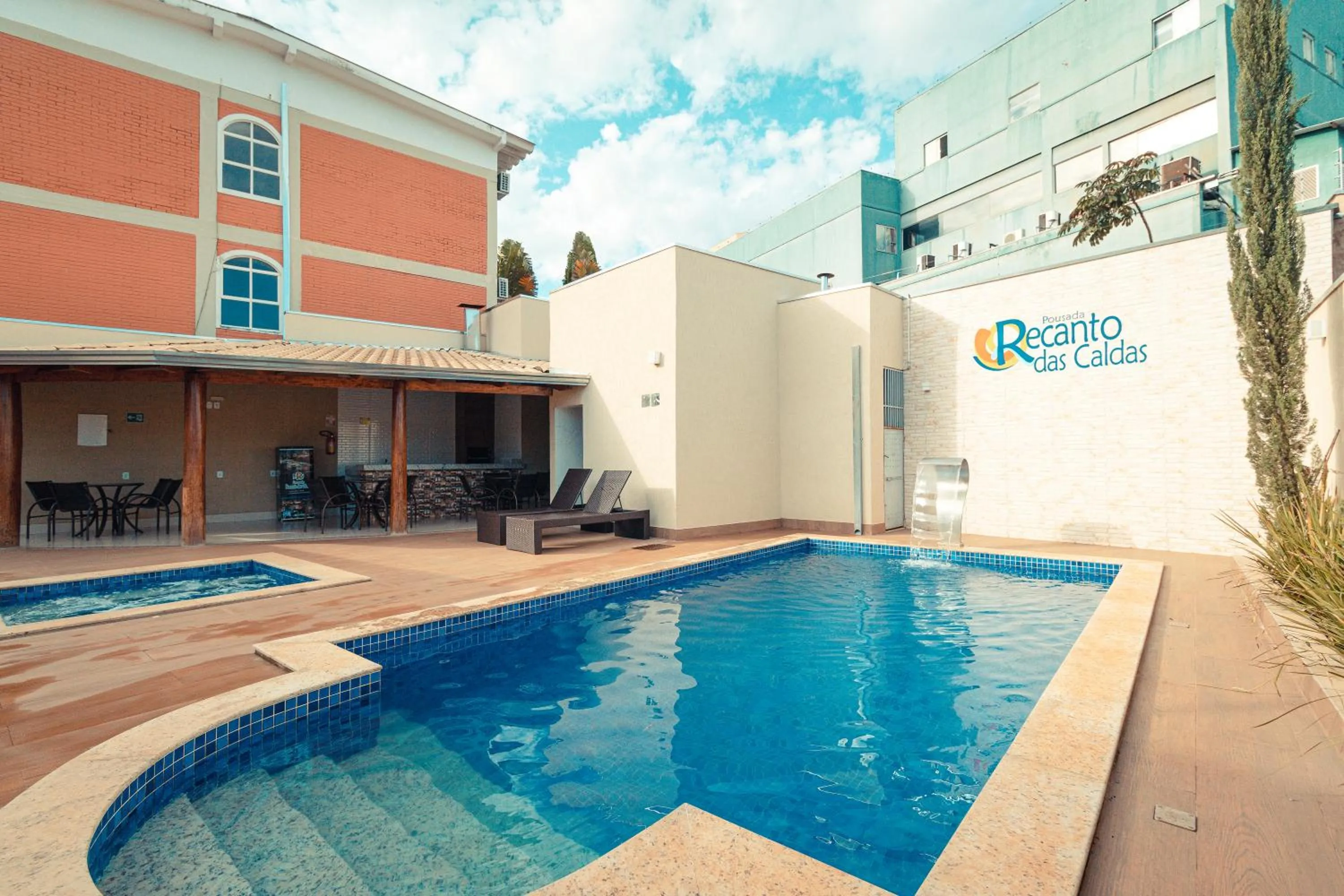 Swimming pool in Pousada Recanto das Caldas