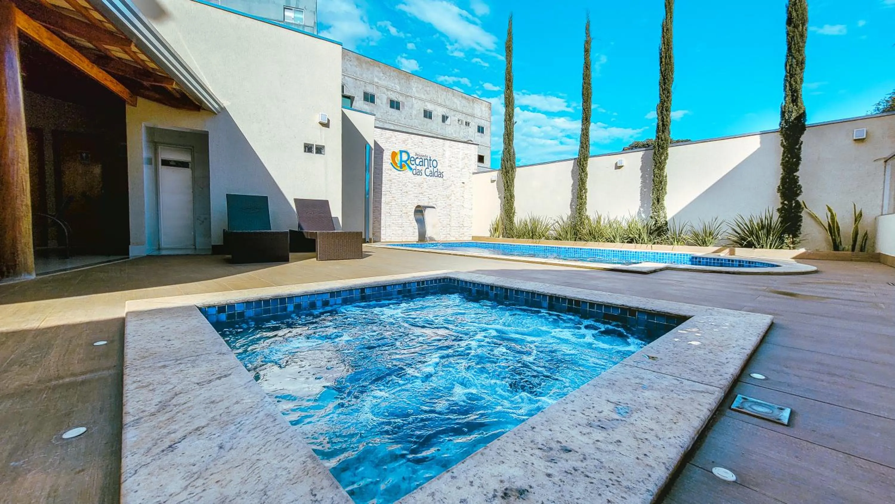 Swimming pool in Pousada Recanto das Caldas