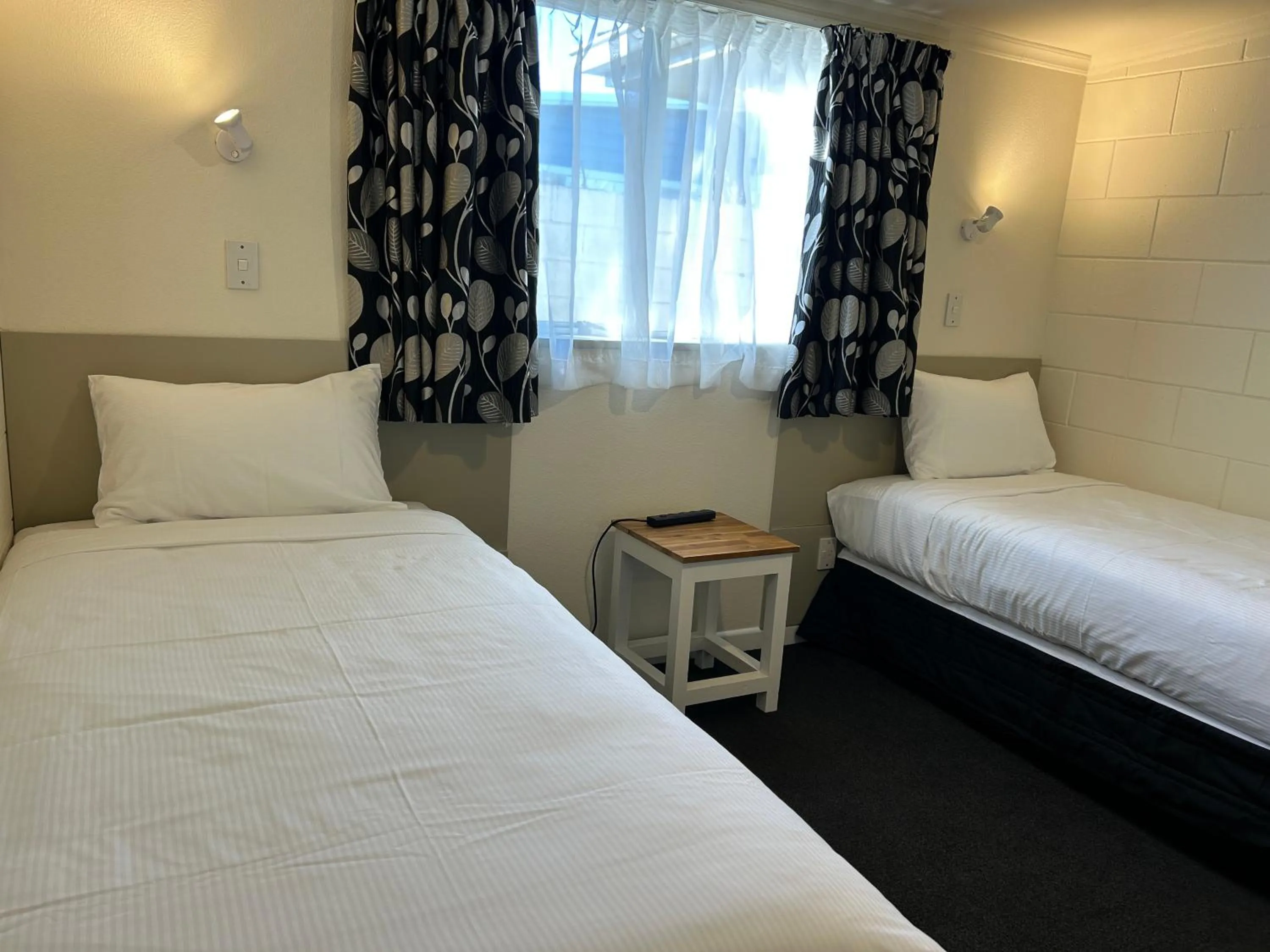 Bed in Montana Lodge Motel