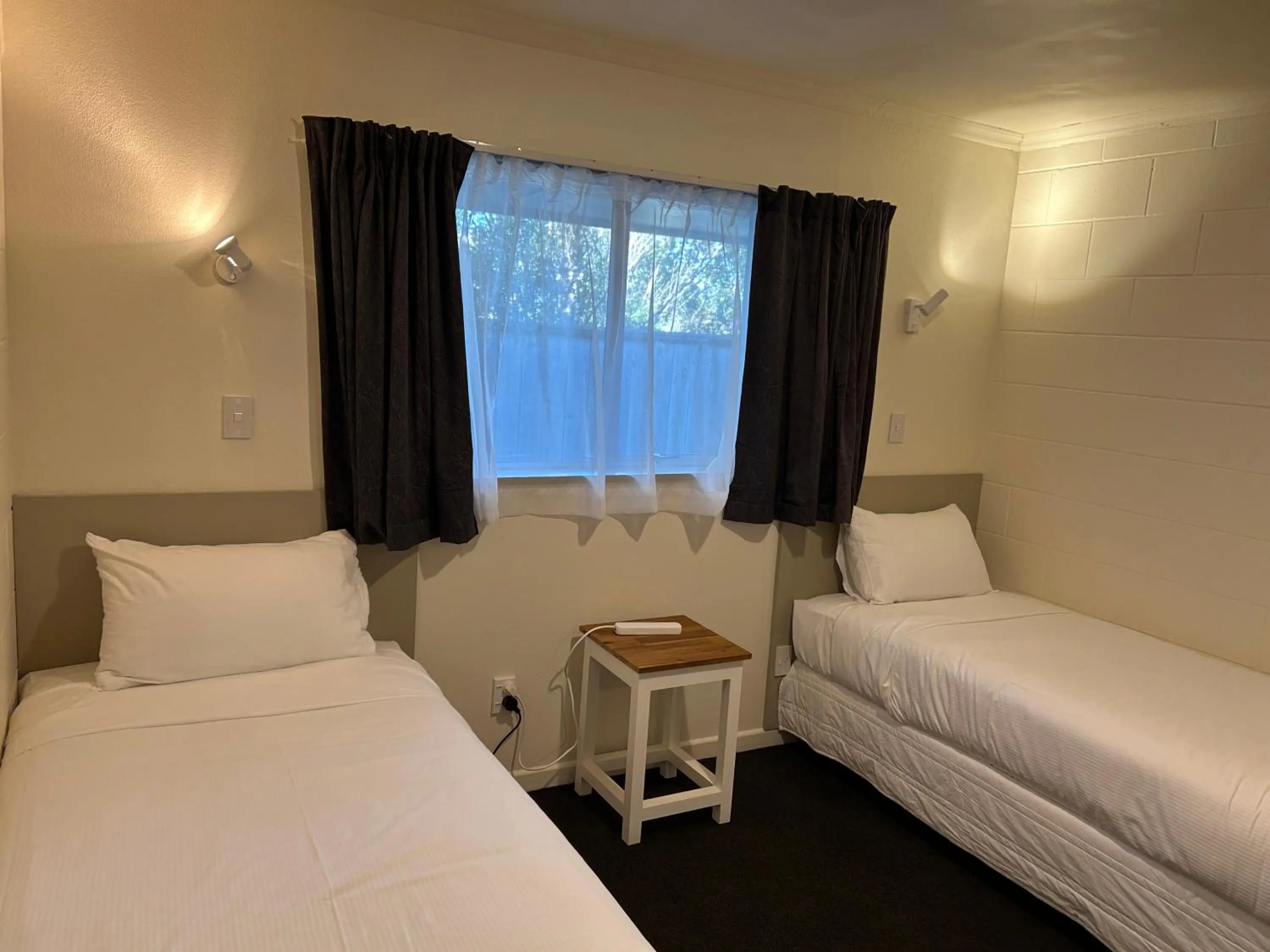 Bed in Montana Lodge Motel