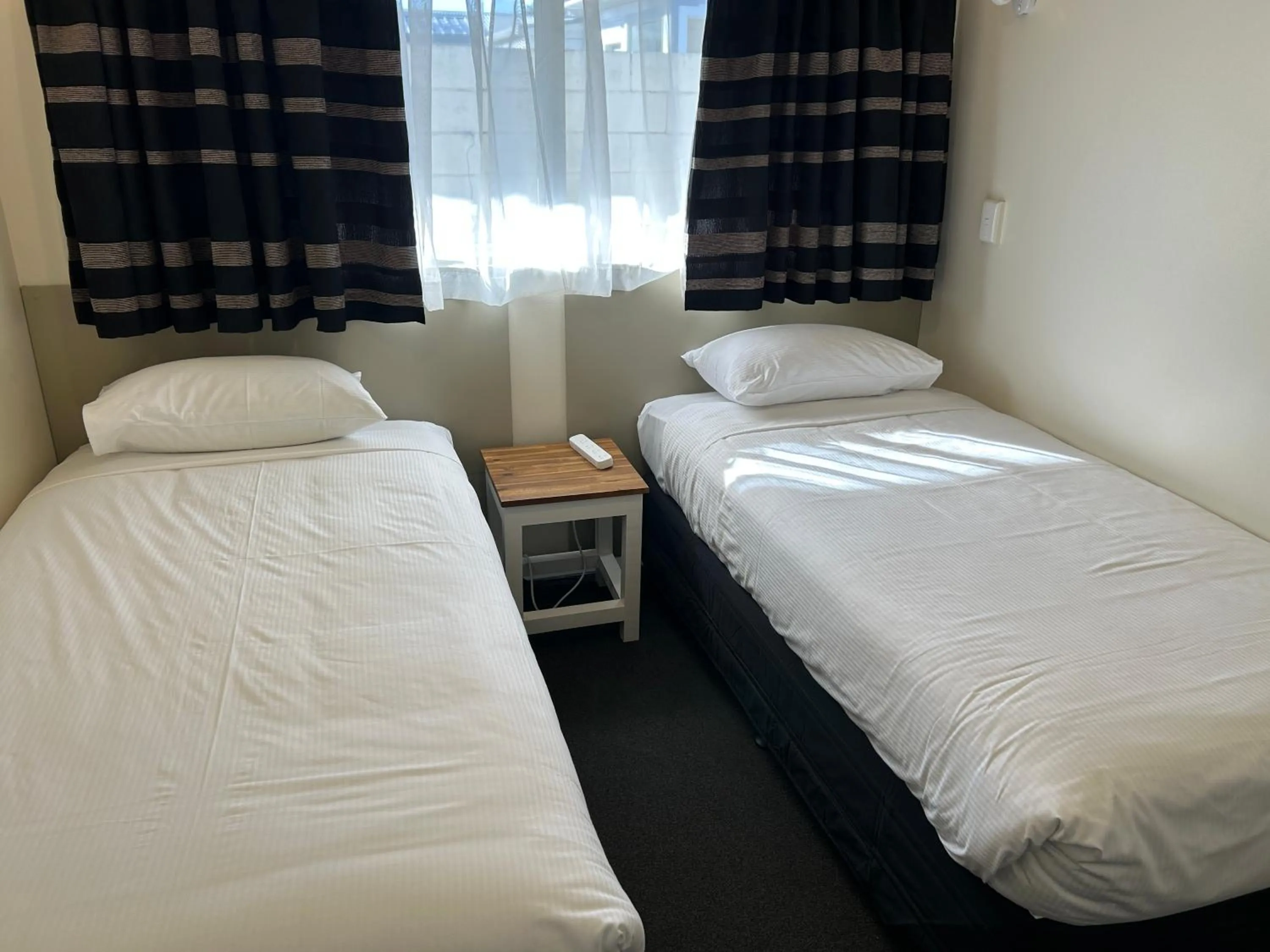 Bed in Montana Lodge Motel