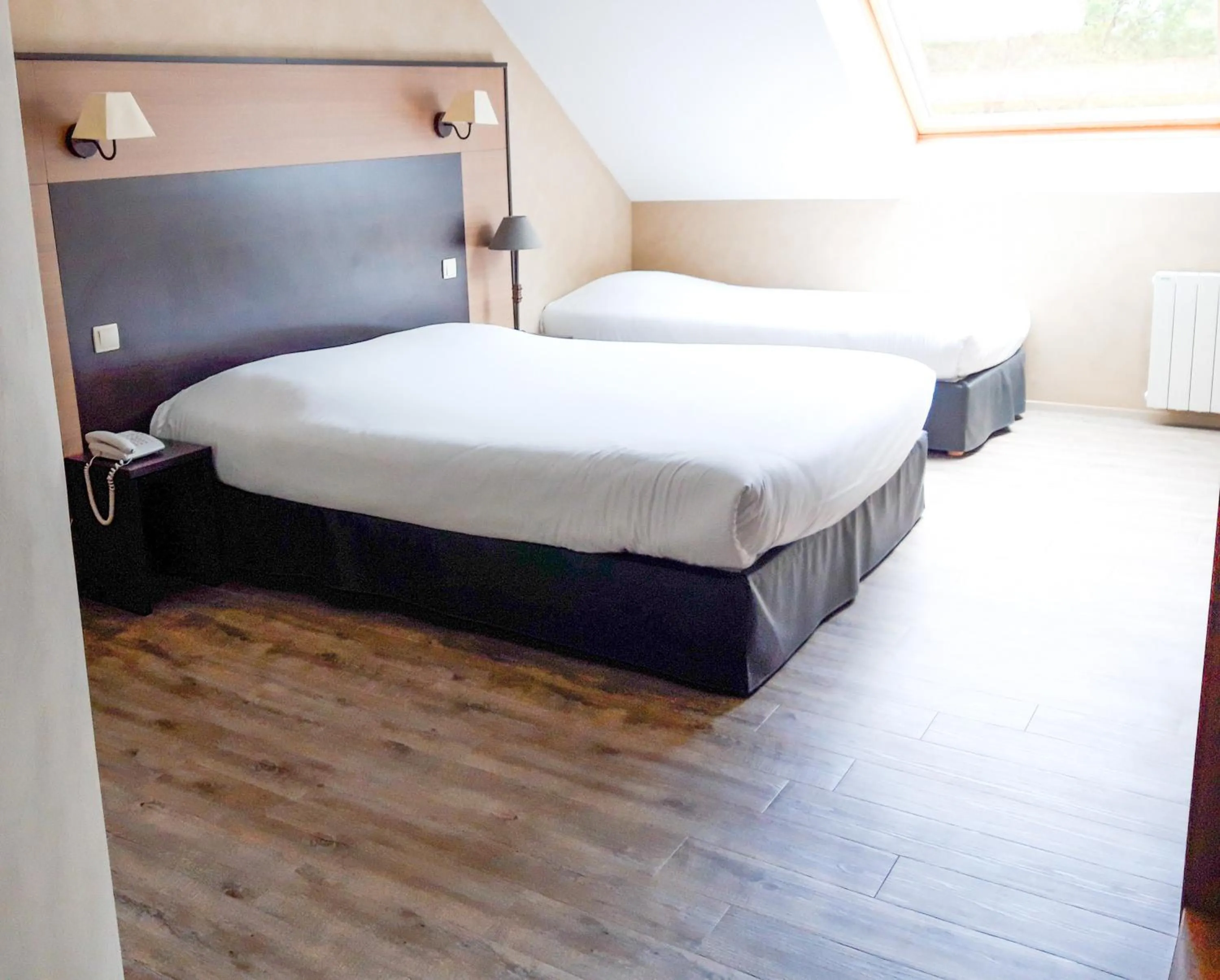 Bed in Hotel Alicia Auray Le Bono