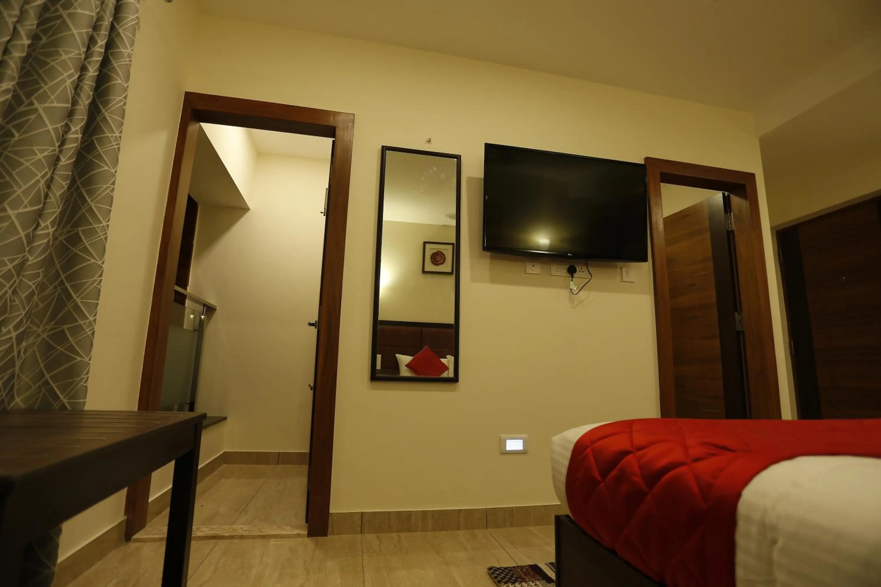 Bed in D Breeze Suites