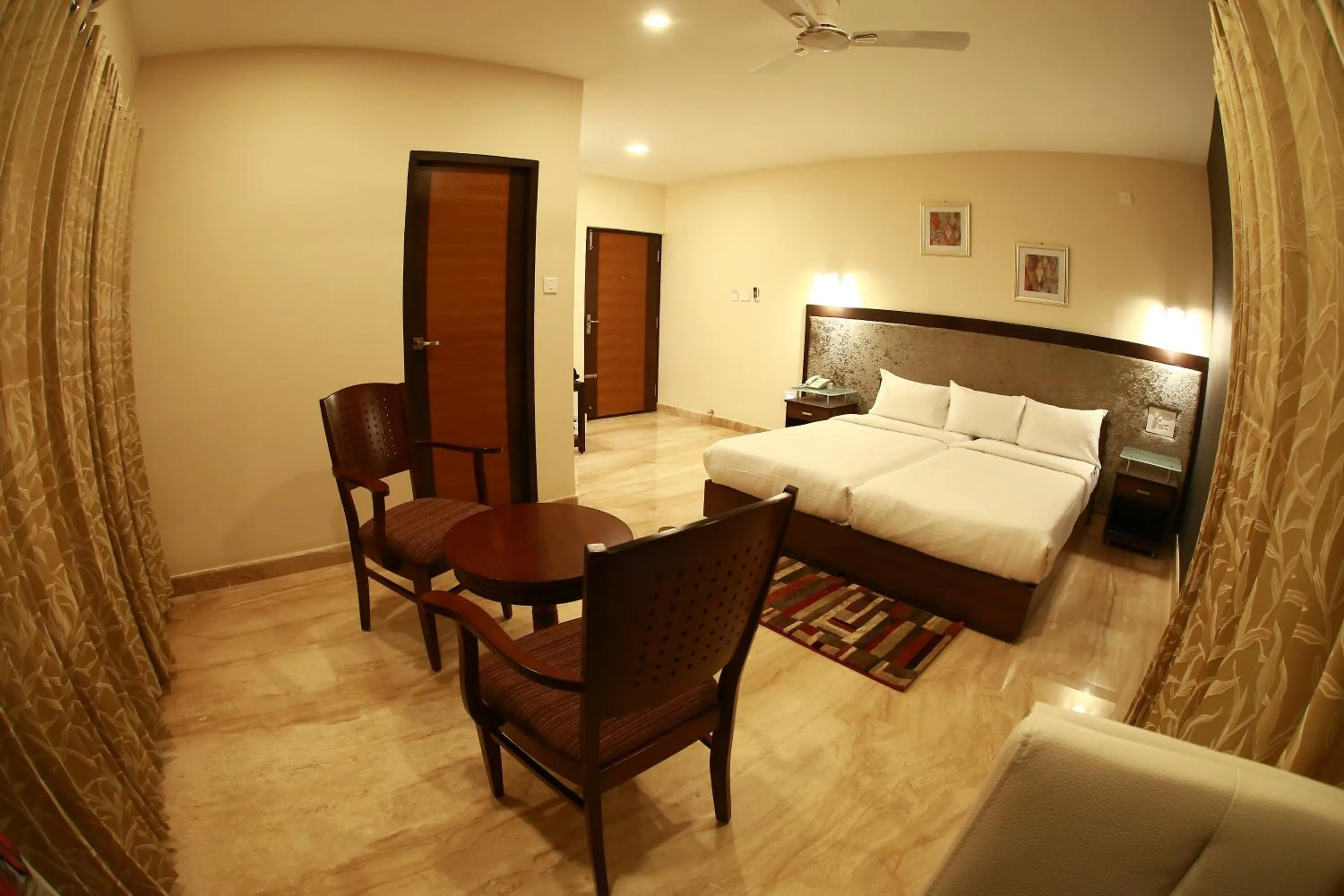 Bed in D Breeze Suites