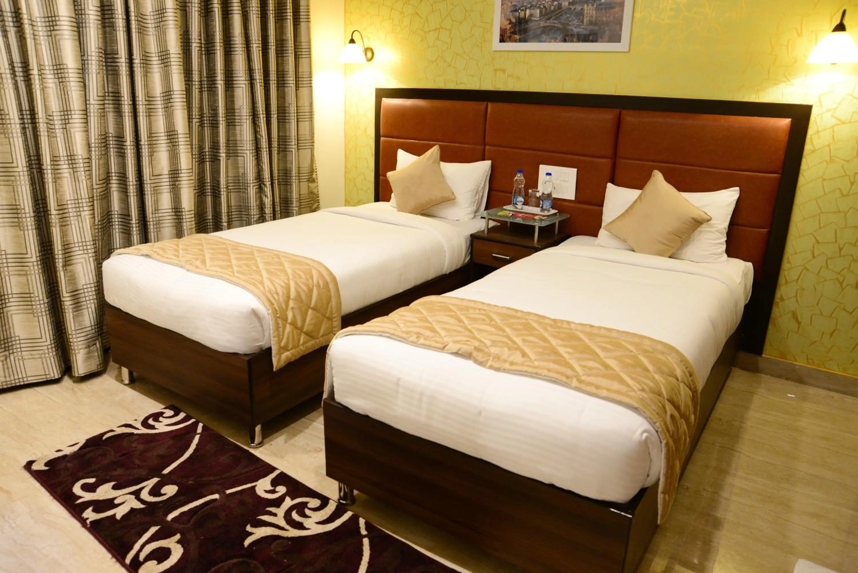 Bed in D Breeze Suites