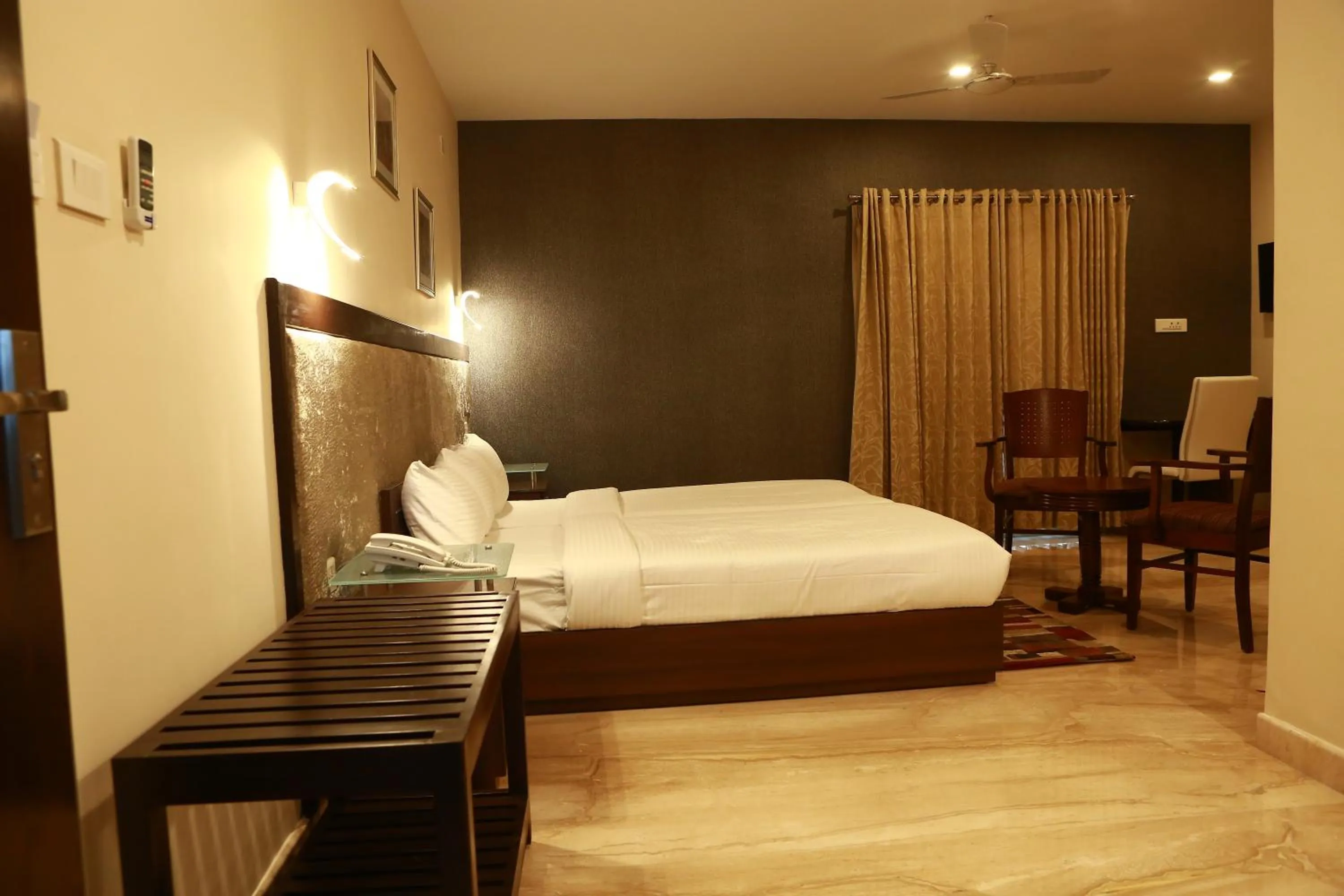 Bed in D Breeze Suites