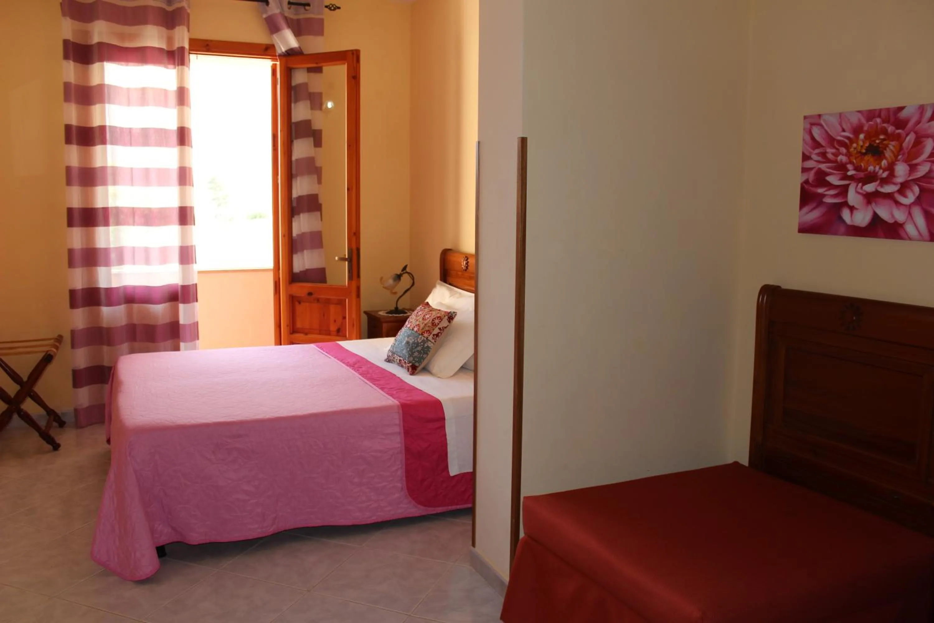 Bed in Raggio di Sole Bed & Breakfast