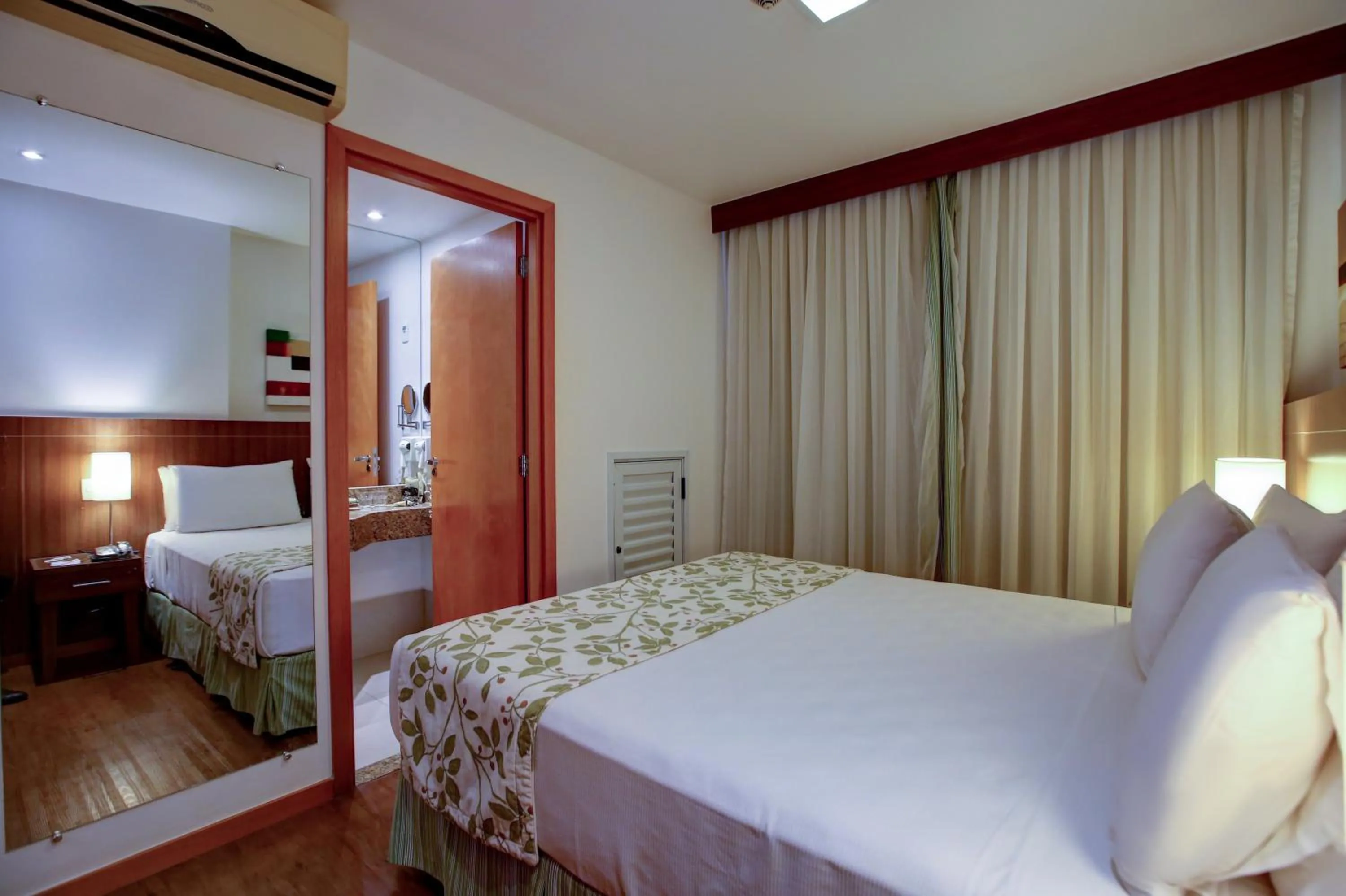 Bed in Nobile Suites Monumental