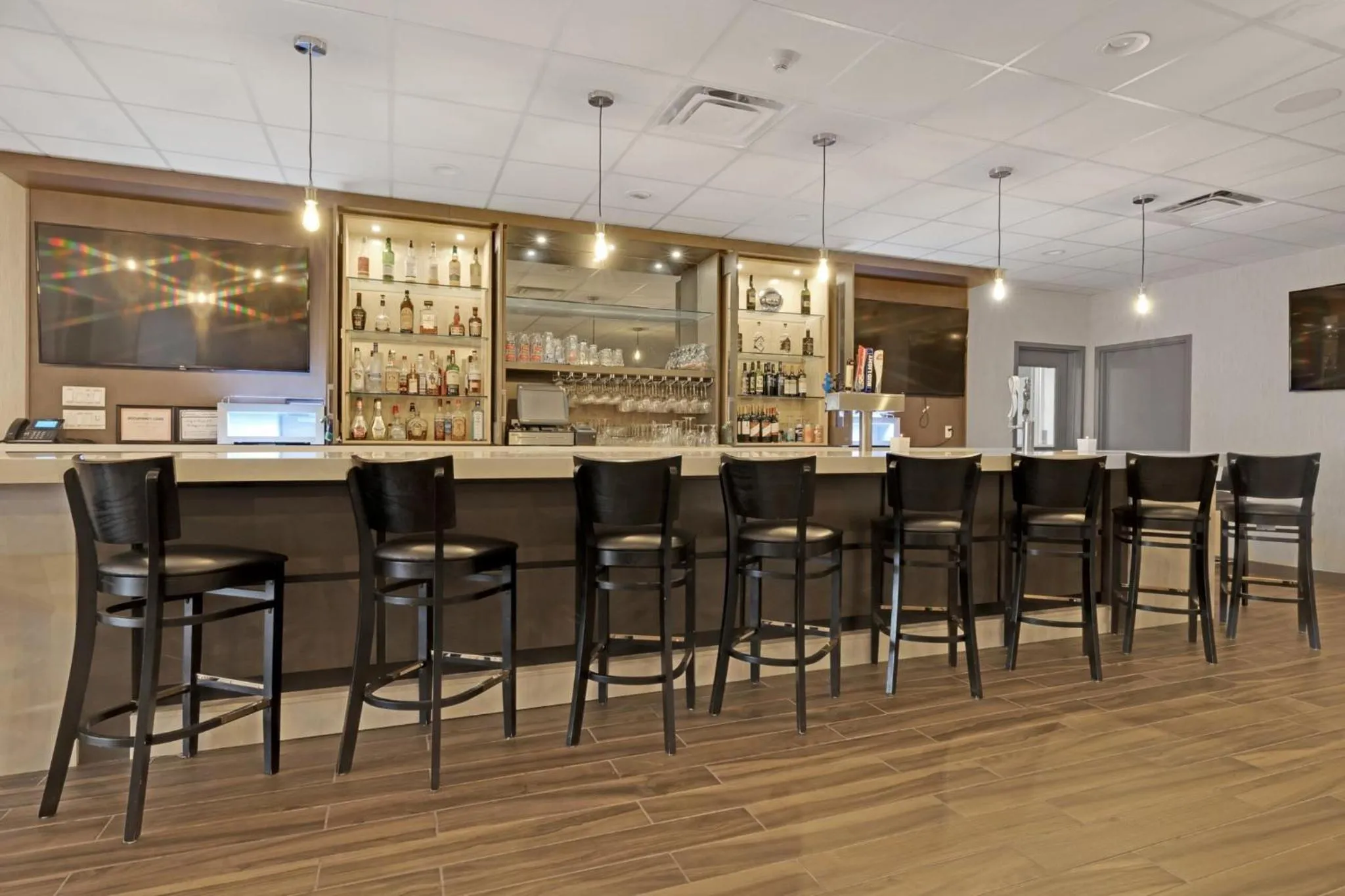 Lounge or bar in Holiday Inn Hotel Peterborough Waterfront by IHG