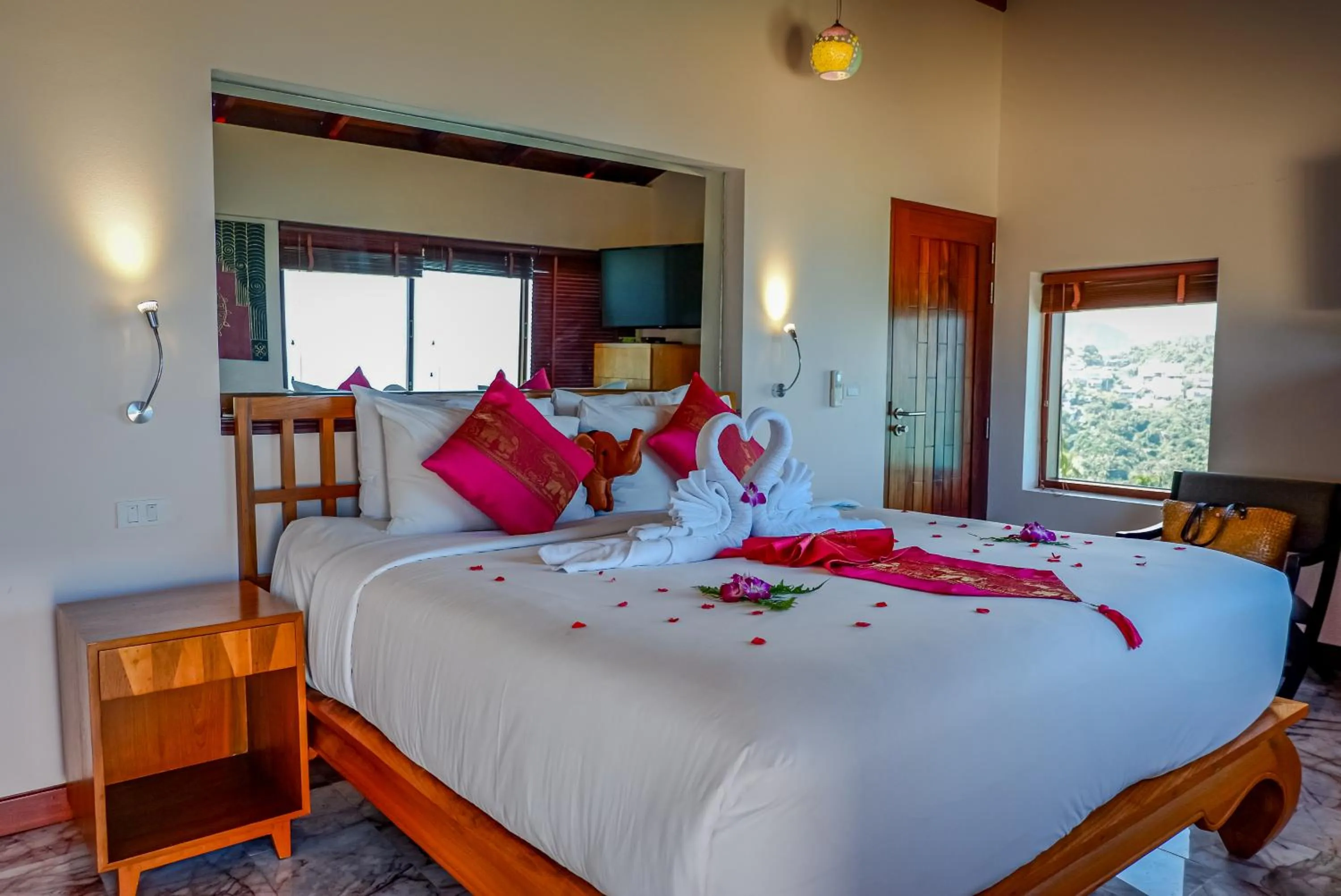Bed in Sandalwood Luxury Villa Resort