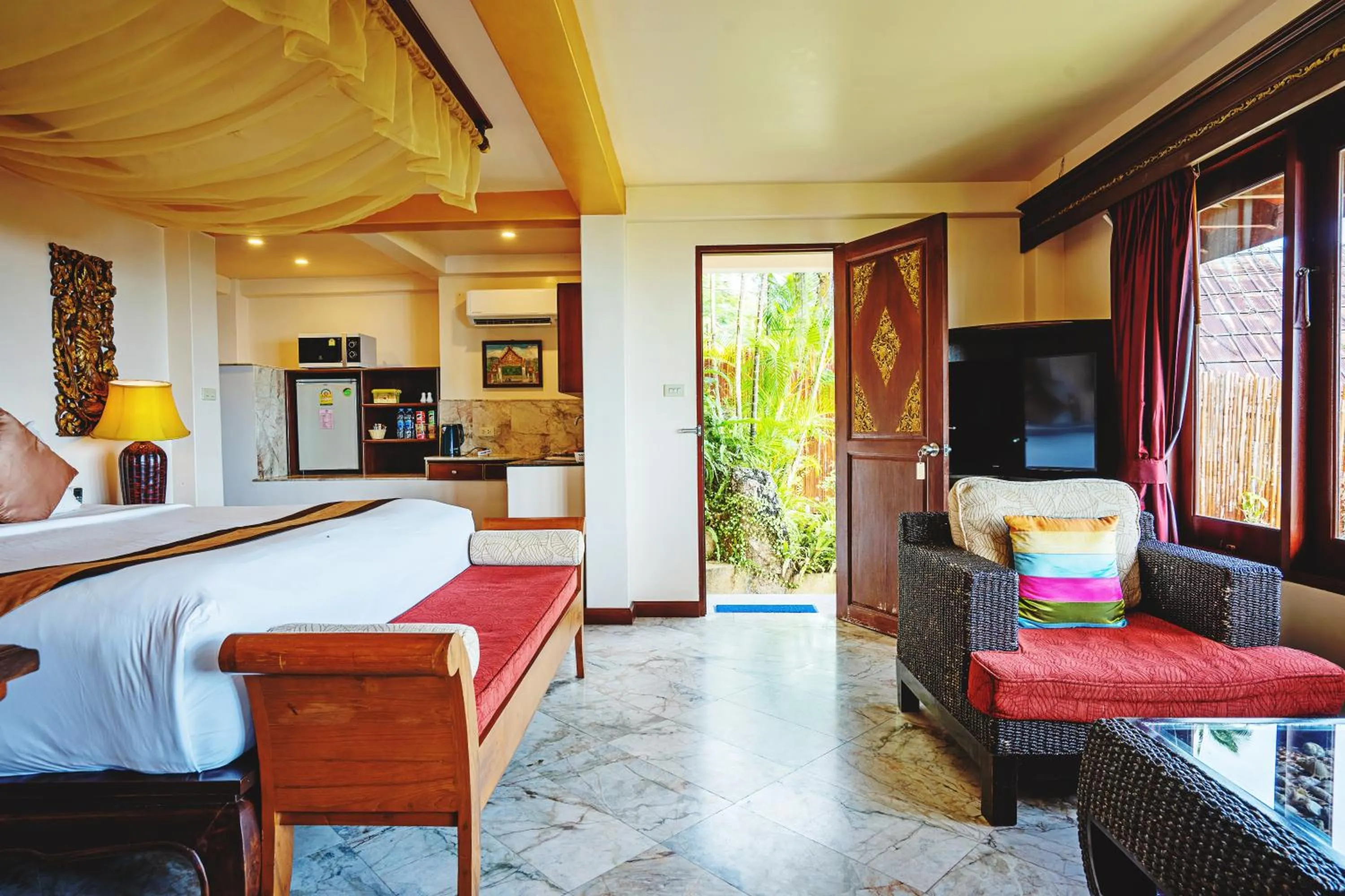 Bed in Sandalwood Luxury Villa Resort
