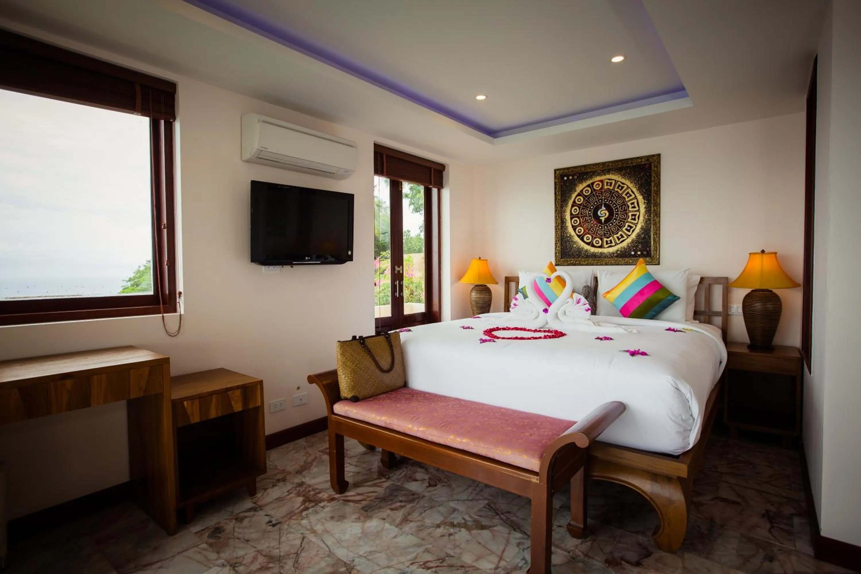 Bed in Sandalwood Luxury Villa Resort