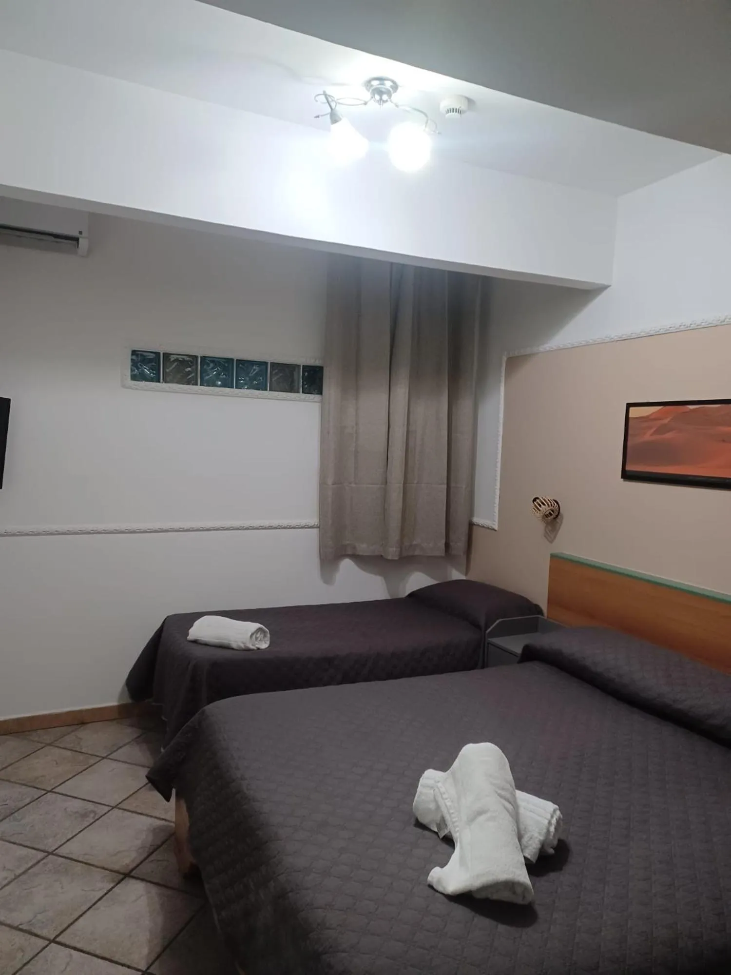 Bed in Hotel Martini