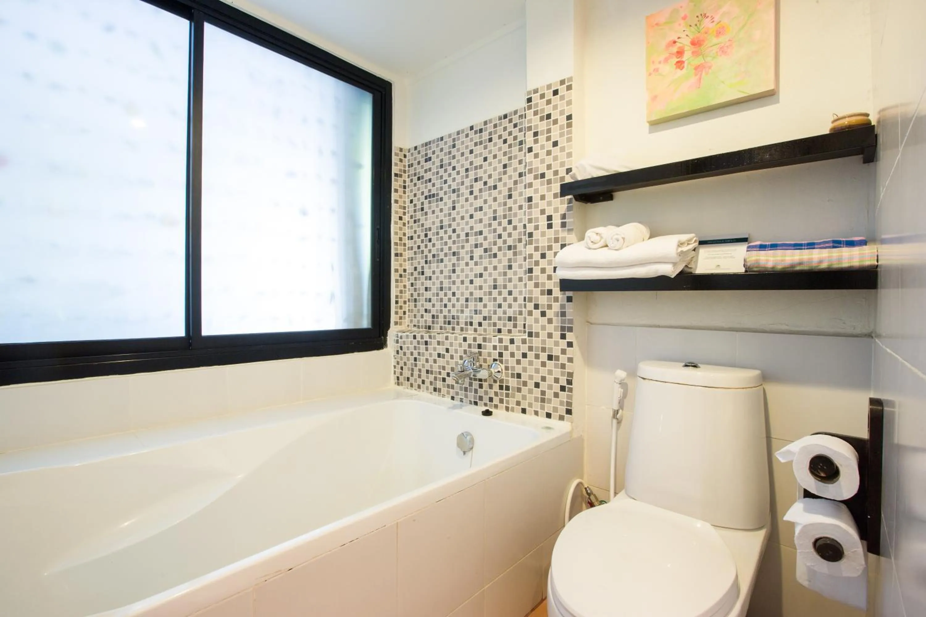 Bed in Vacation Village Phra Nang Inn - SHA Extra Plus