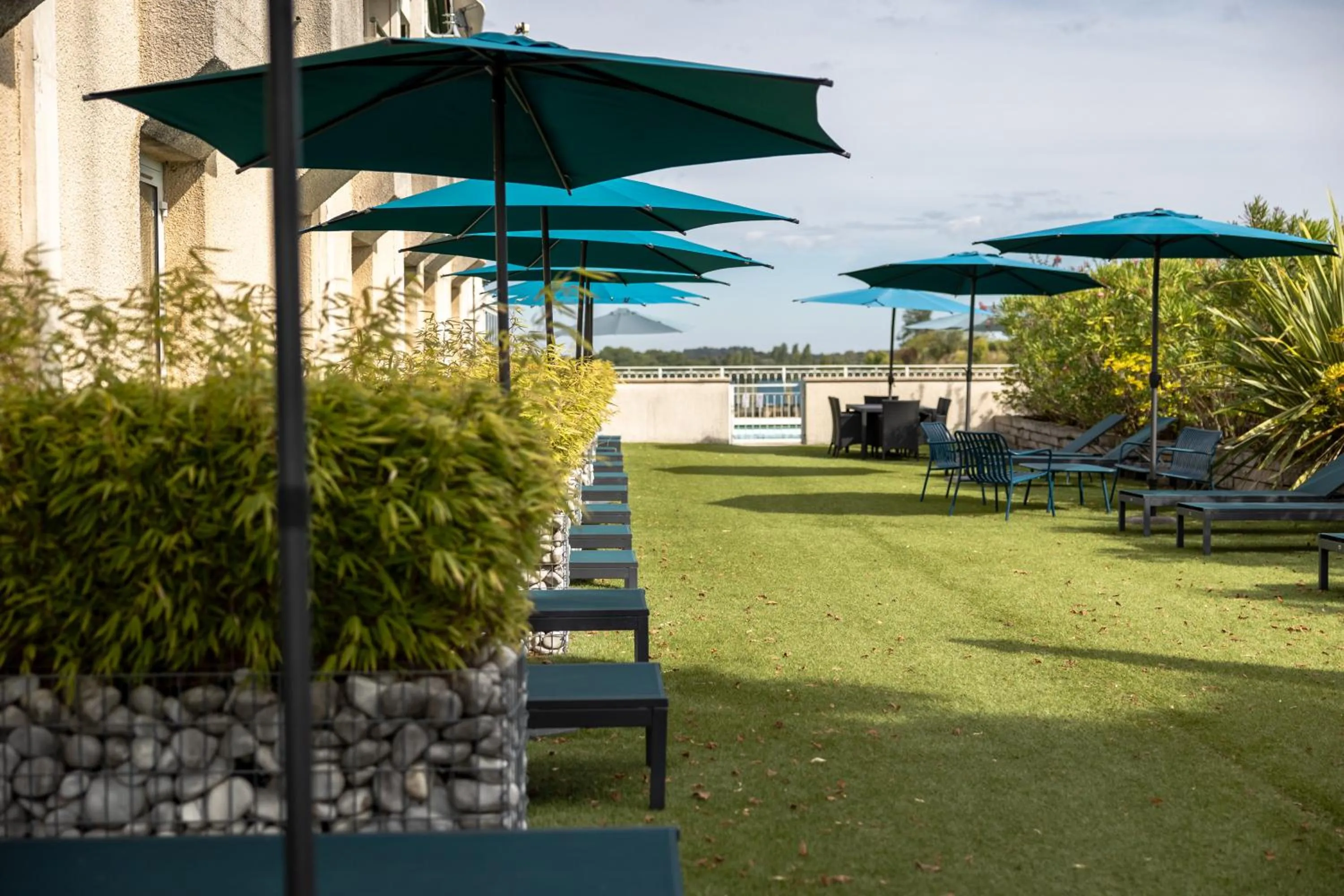 Patio in Pey La Tour - Logis Hôtels & Restaurant