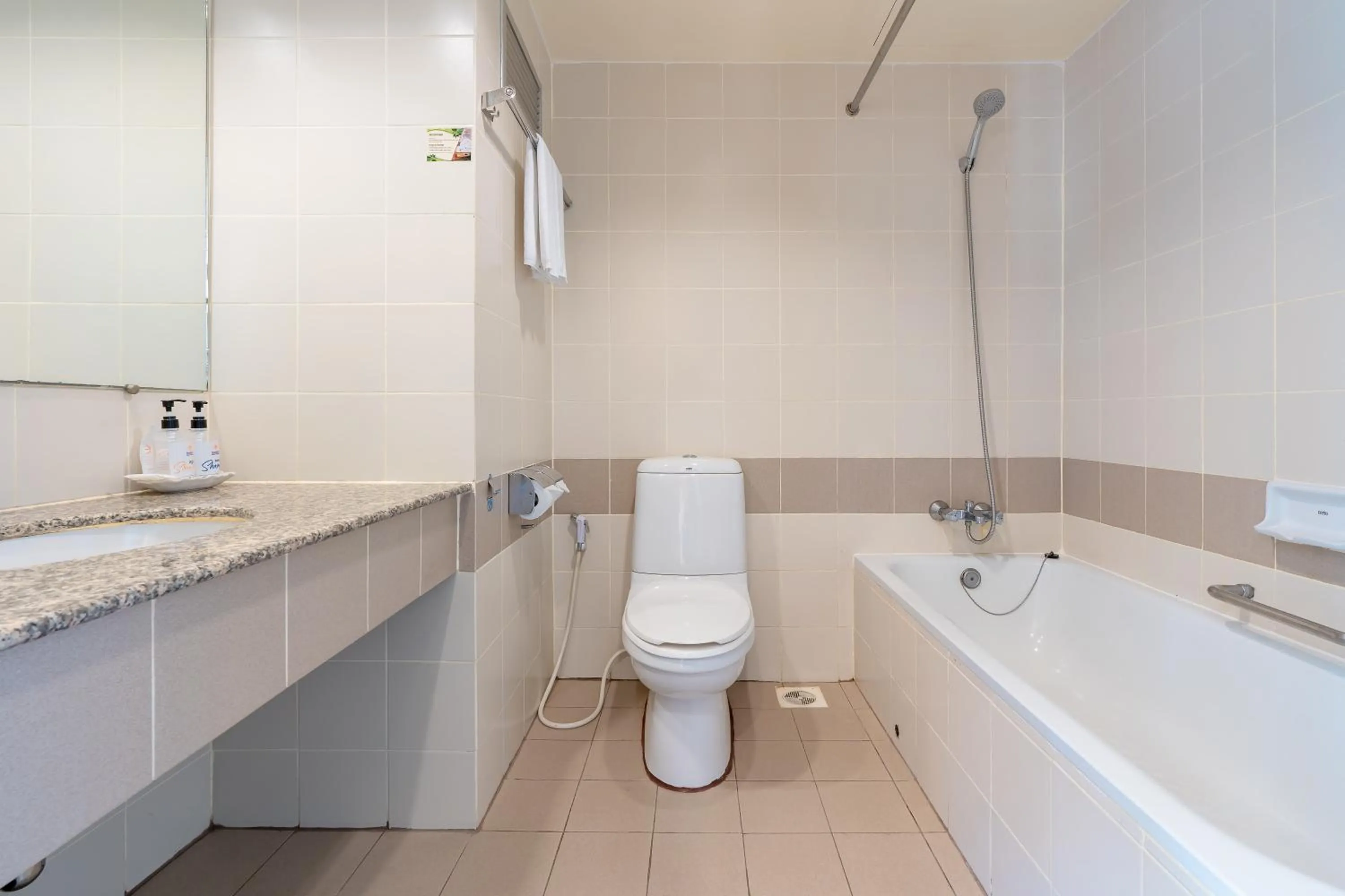 Toilet in Sunshine Hotel & Residences