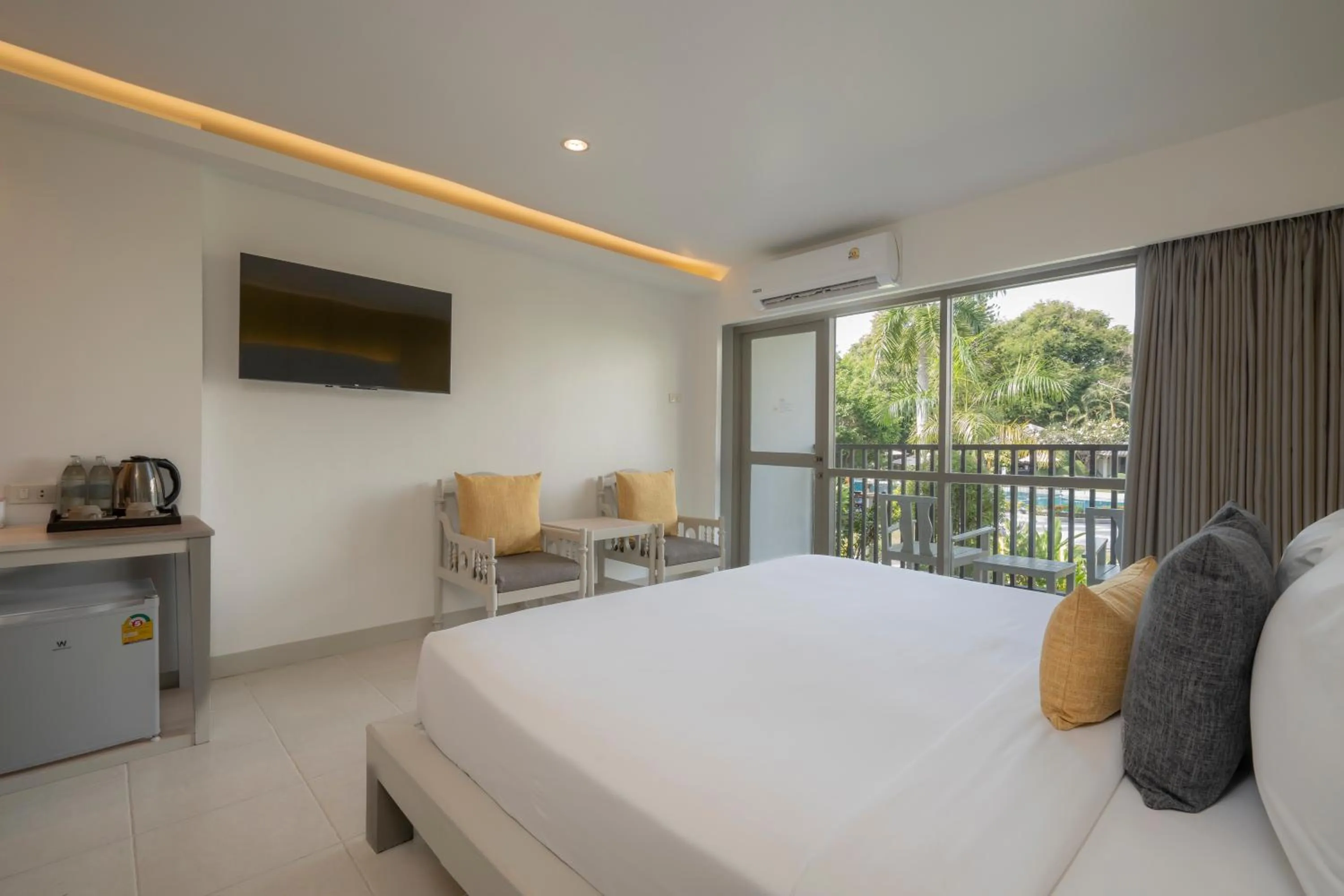 Bed in Sunshine Garden Resort