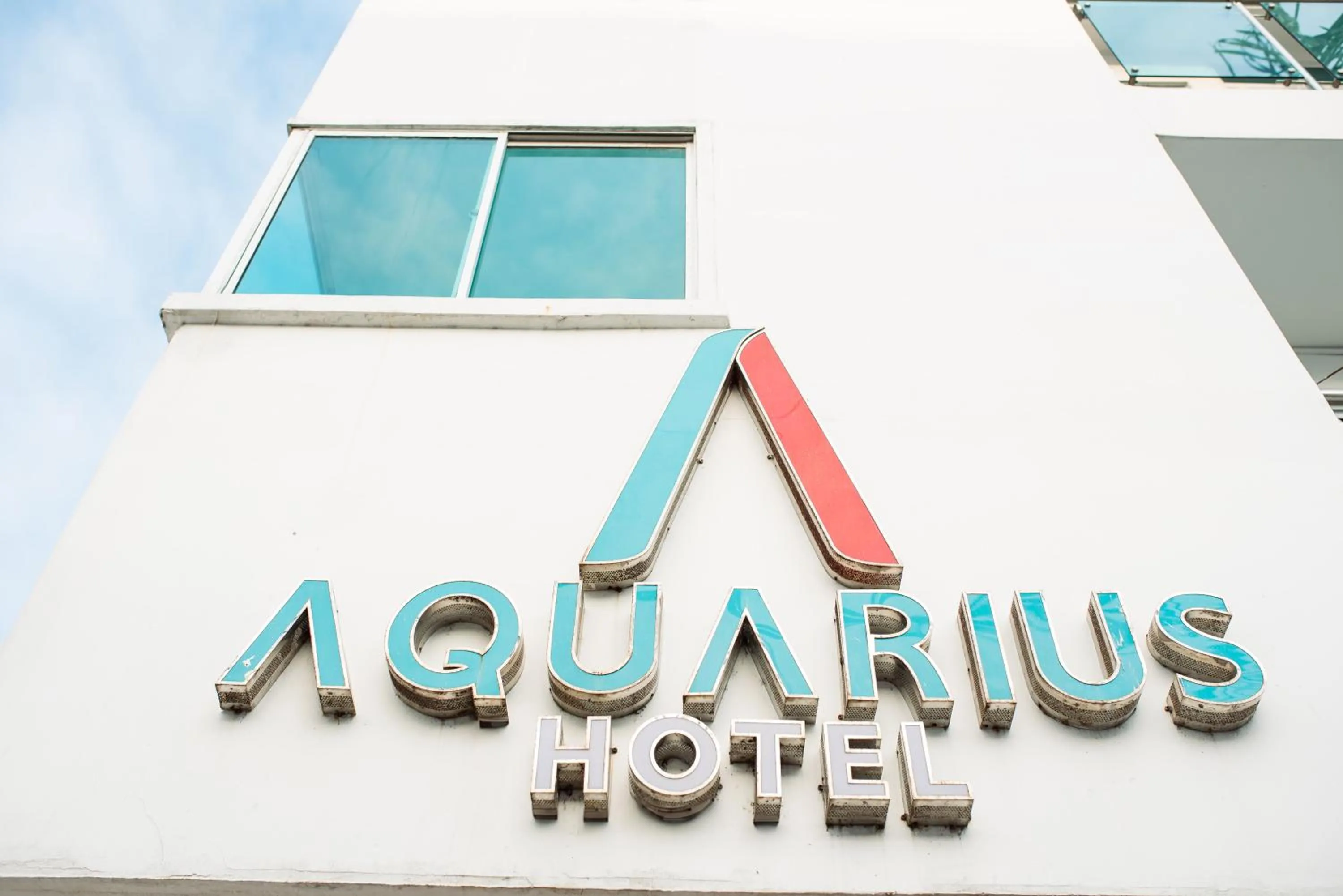 Property logo or sign in Hotel Aquarius