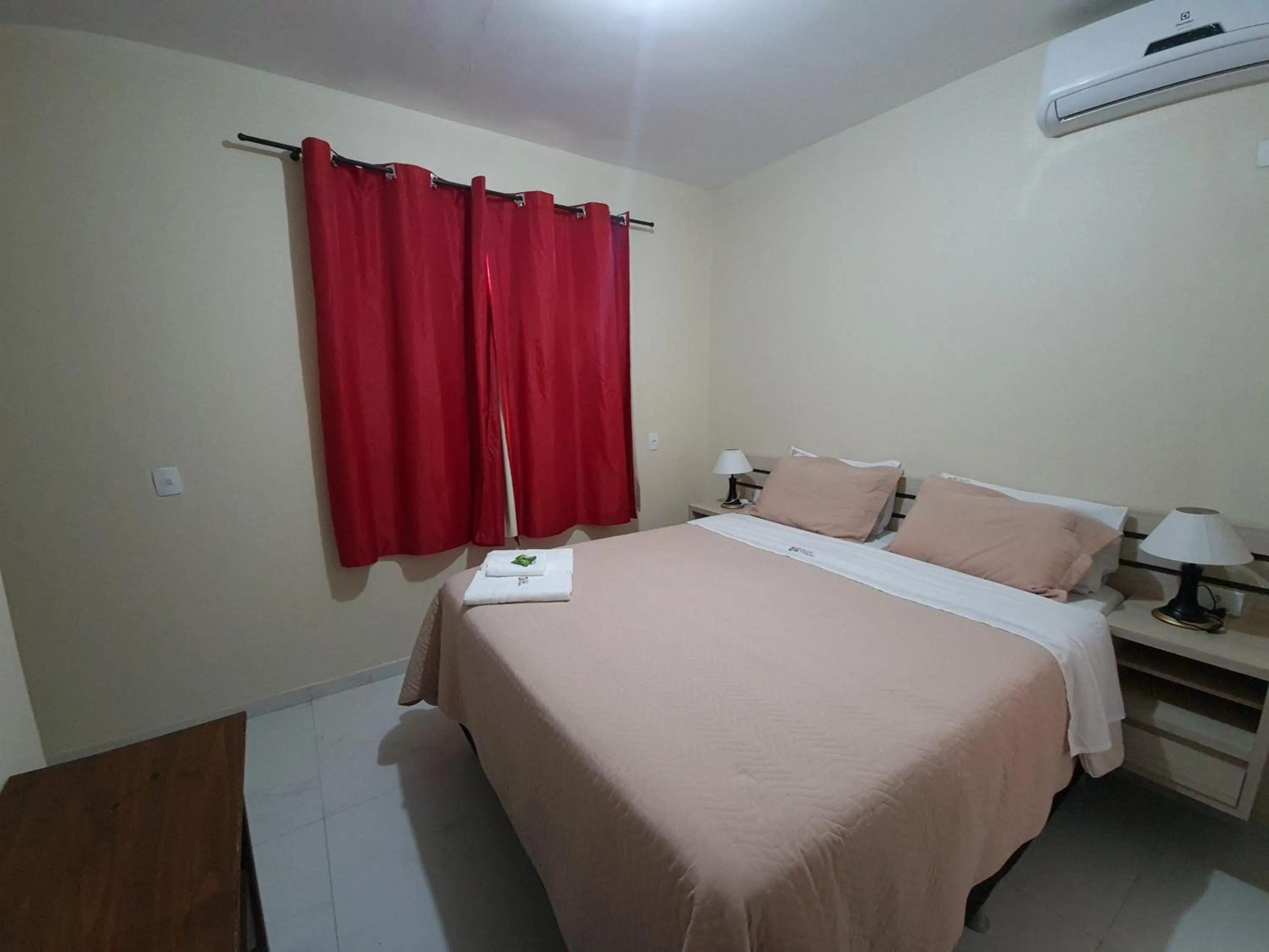 Bed in Pousada Quatro Estações