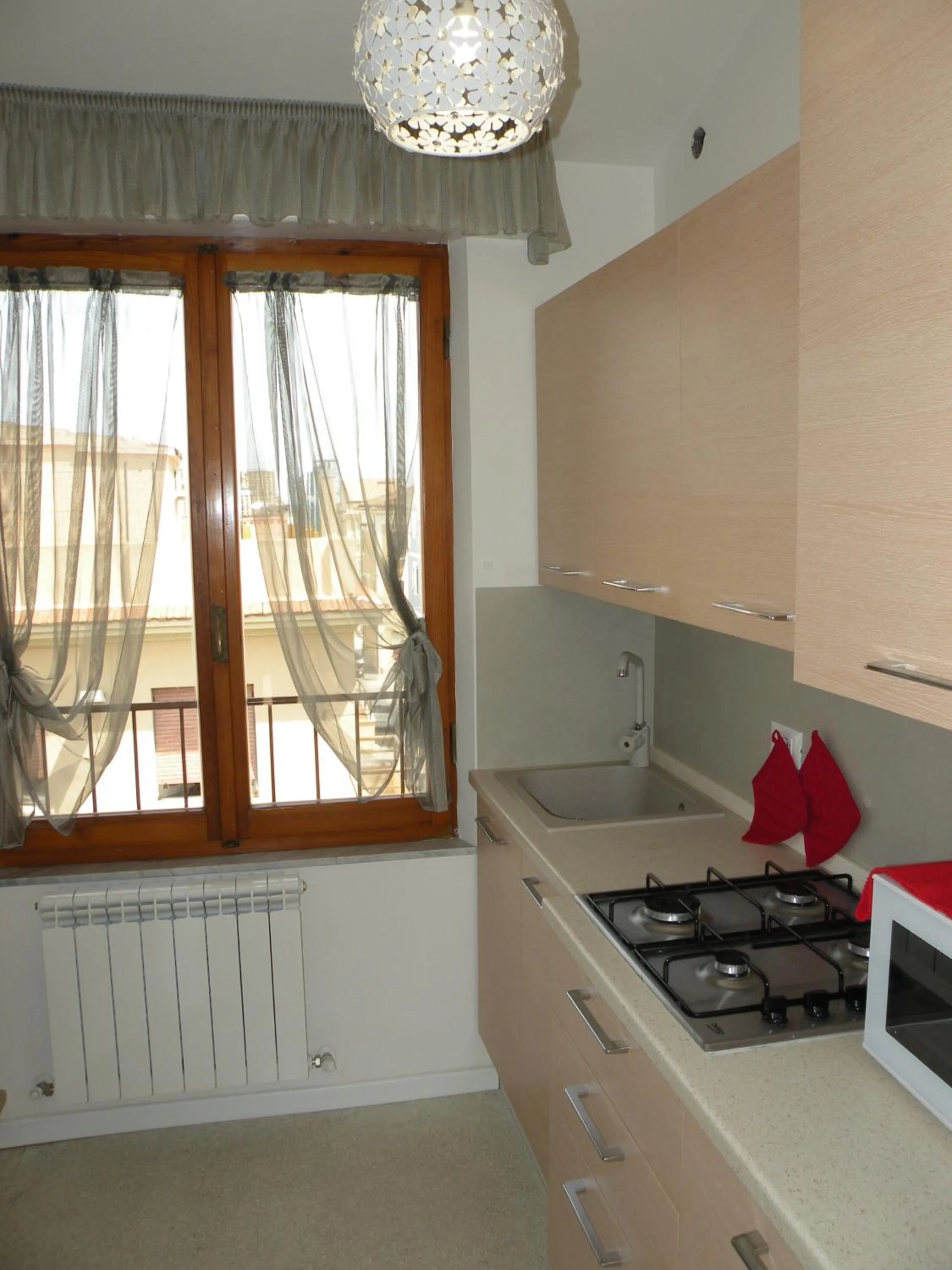 Kitchen or kitchenette in La Casa sul Corso B&B