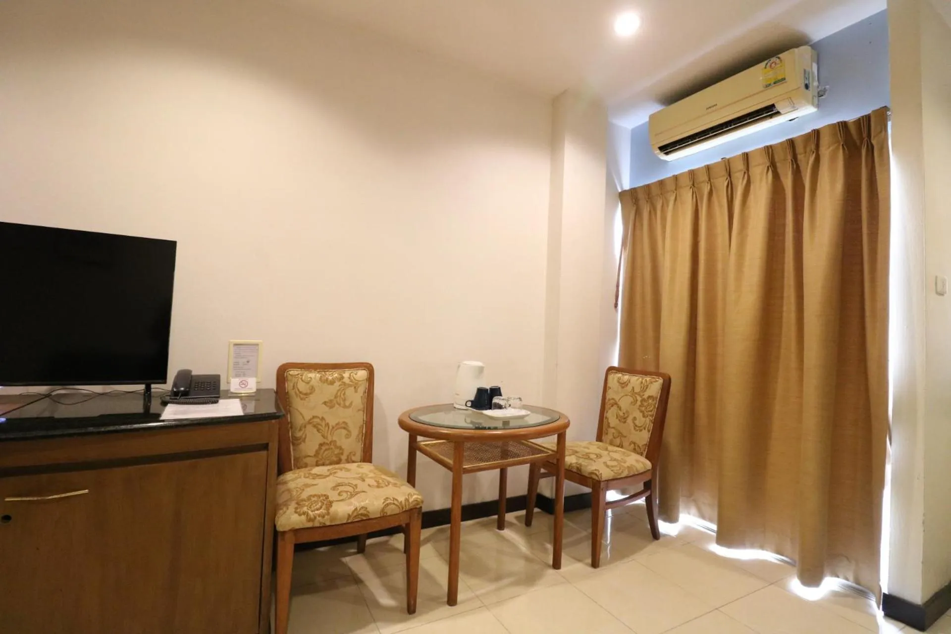 Seating area in JL Bangkok Hotel