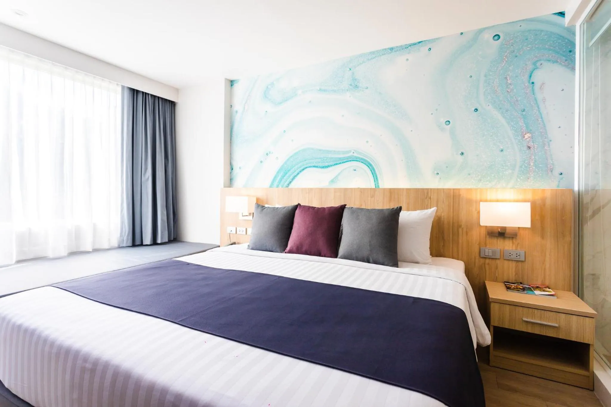 Bed in Coconut Village Resort Phuket - SHA Extra Plus